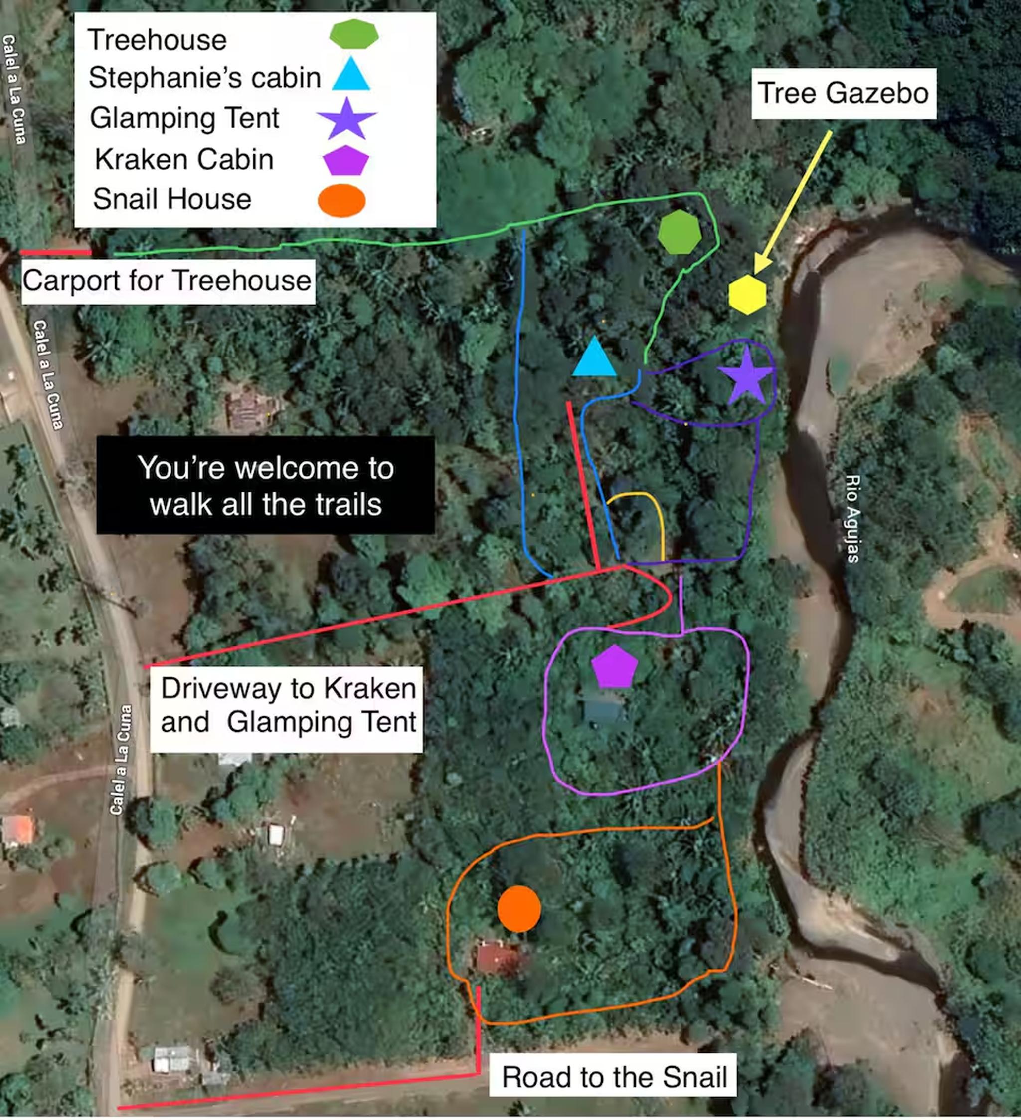 Aerial map of the retreat with trails, unique stays, and riverside setting