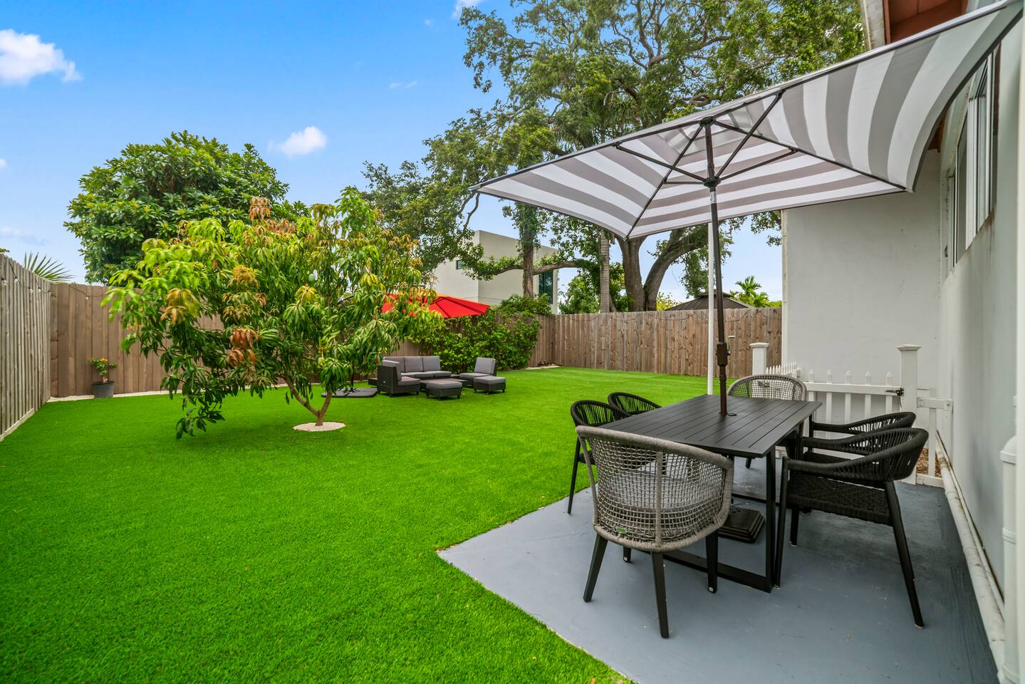 Beautifully landscaped outdoor spaces offer the perfect setting for morning coffee, family gatherings, or quiet evenings outdoors.