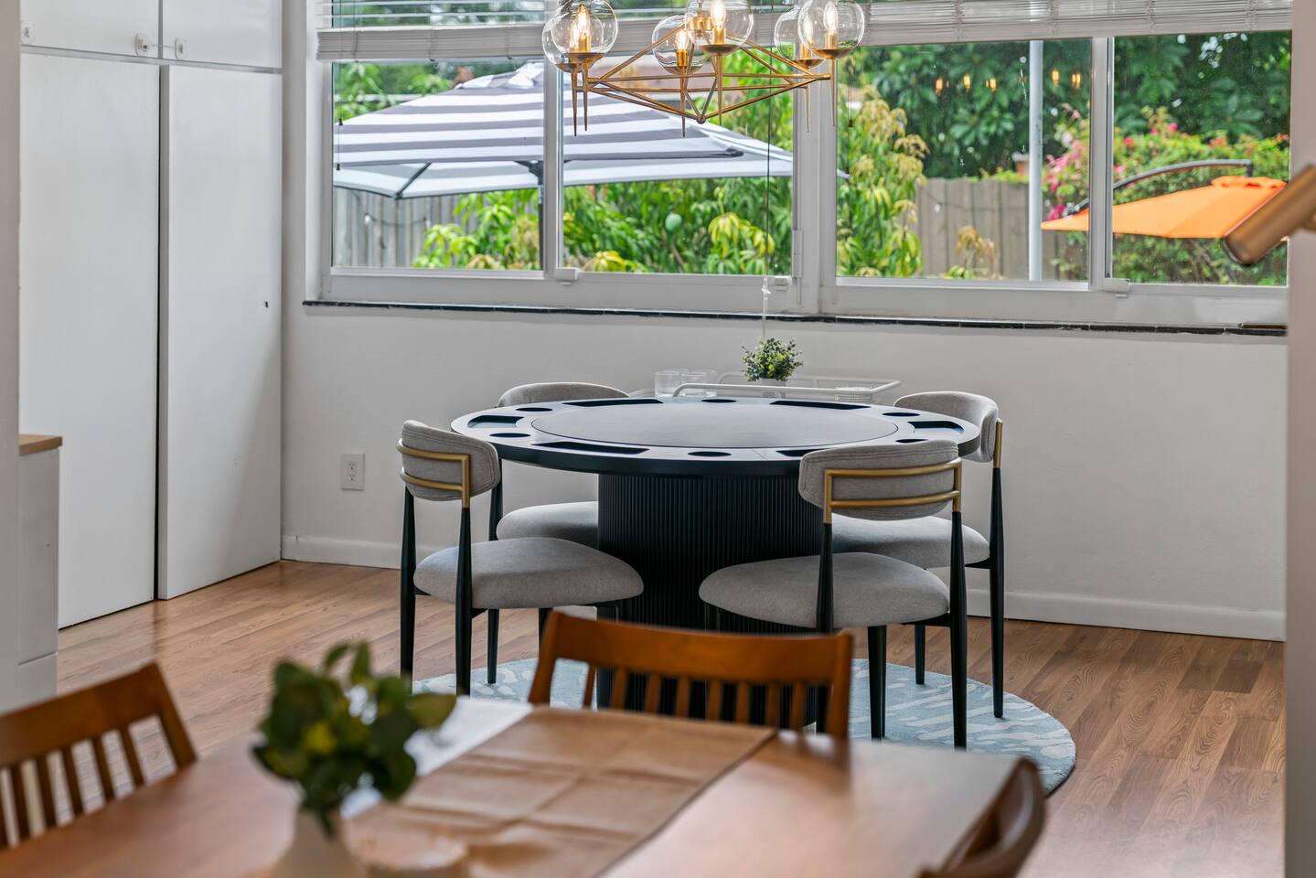 Relax and play your favorite card games with peaceful backyard views.