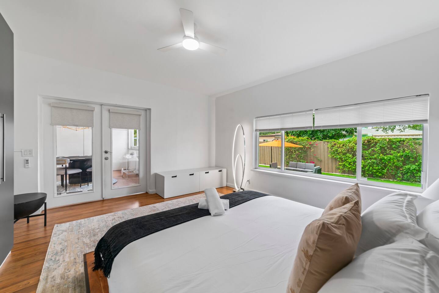 Wake up to peaceful garden views in this bright and inviting space.