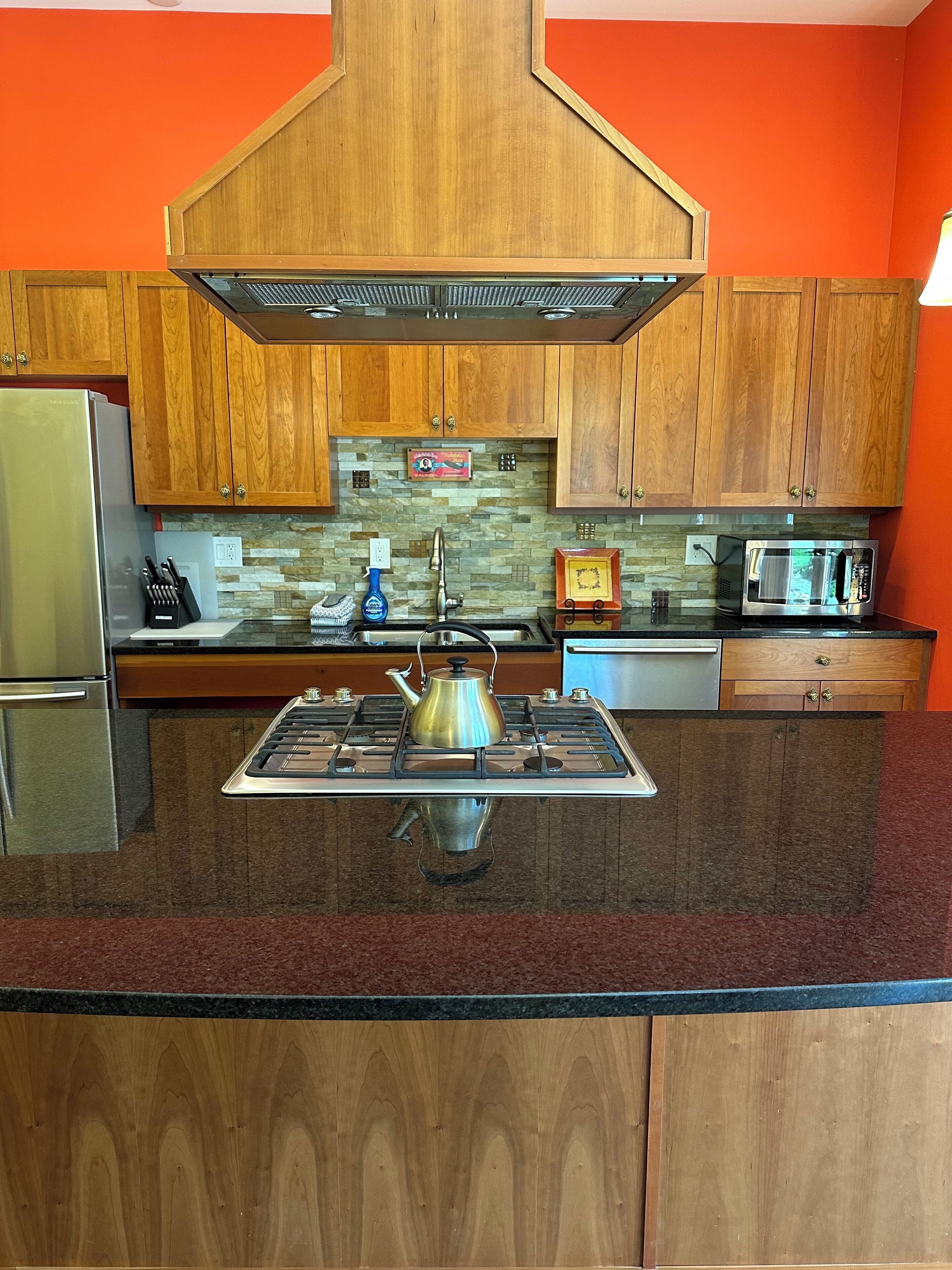 Gas stove with electric oven