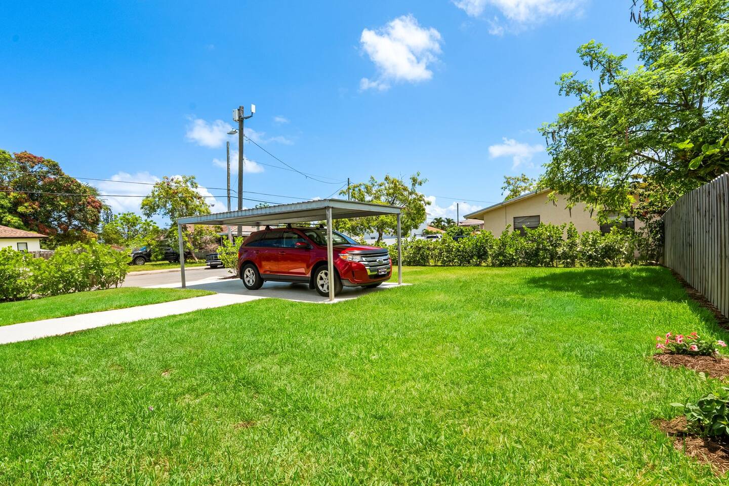 Note: the car is being stored under the car port and is not for guest use, but please feel free to park behind it for your additional parking needs.