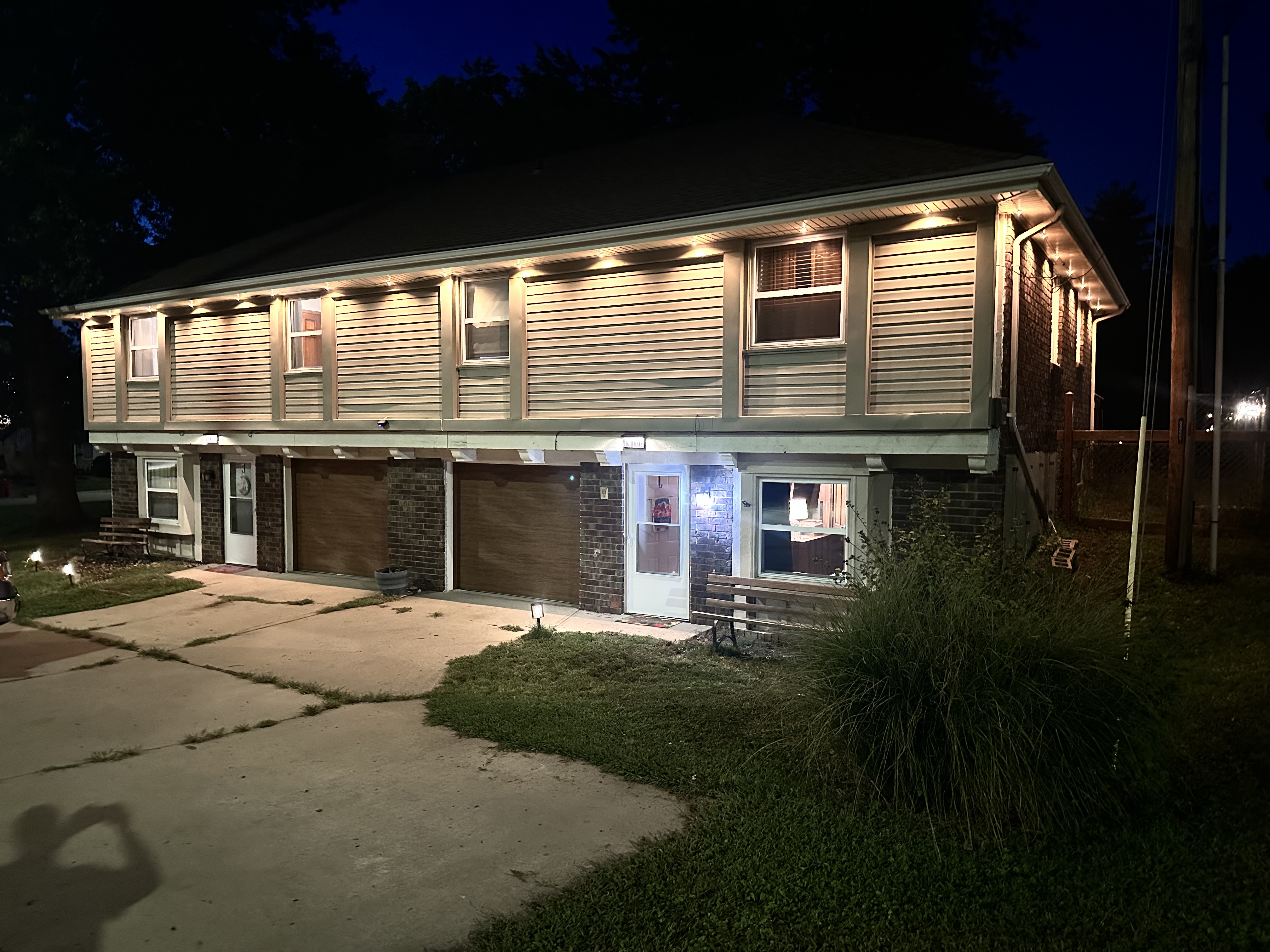 Well-lit exterior with ample parking and easy private entry