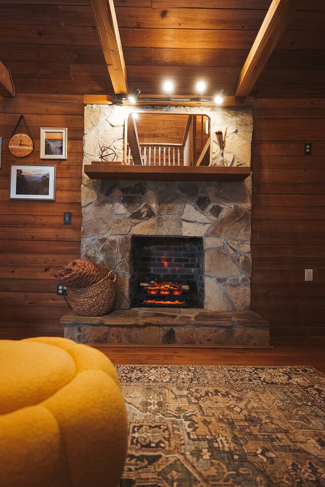 An electric fireplace adds some extra cozy