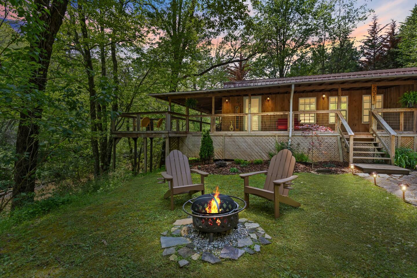 Water views w/ covered porch + fire pit + sauna