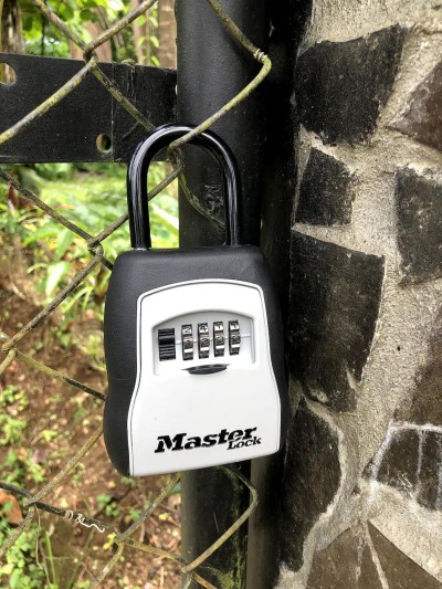 Secure self-check-in with keypad lock at the property entrance