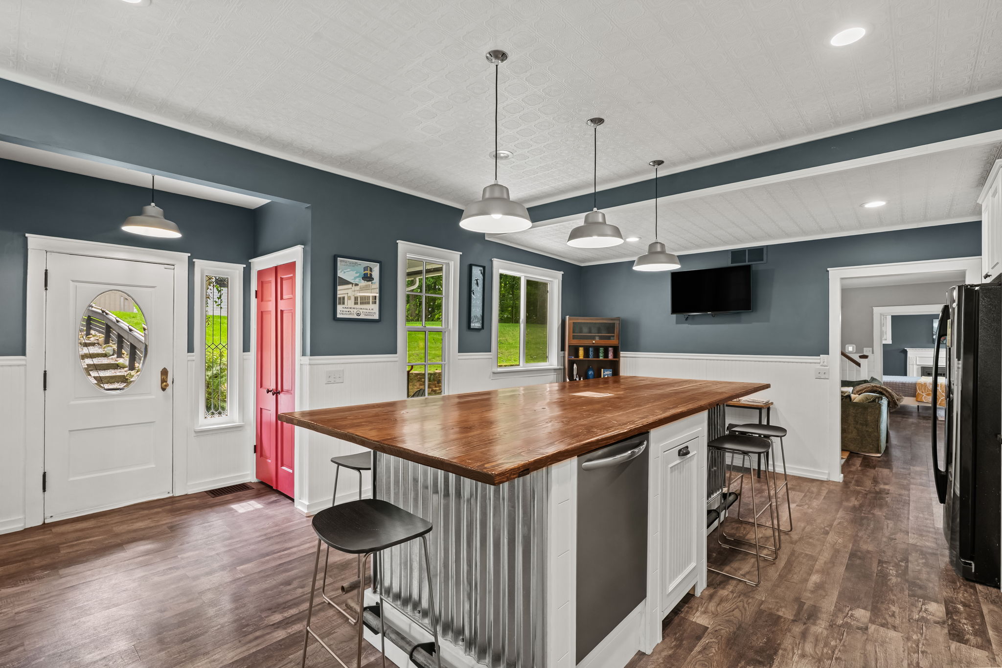Spacious, light-filled kitchen with large island and stylish modern finishes