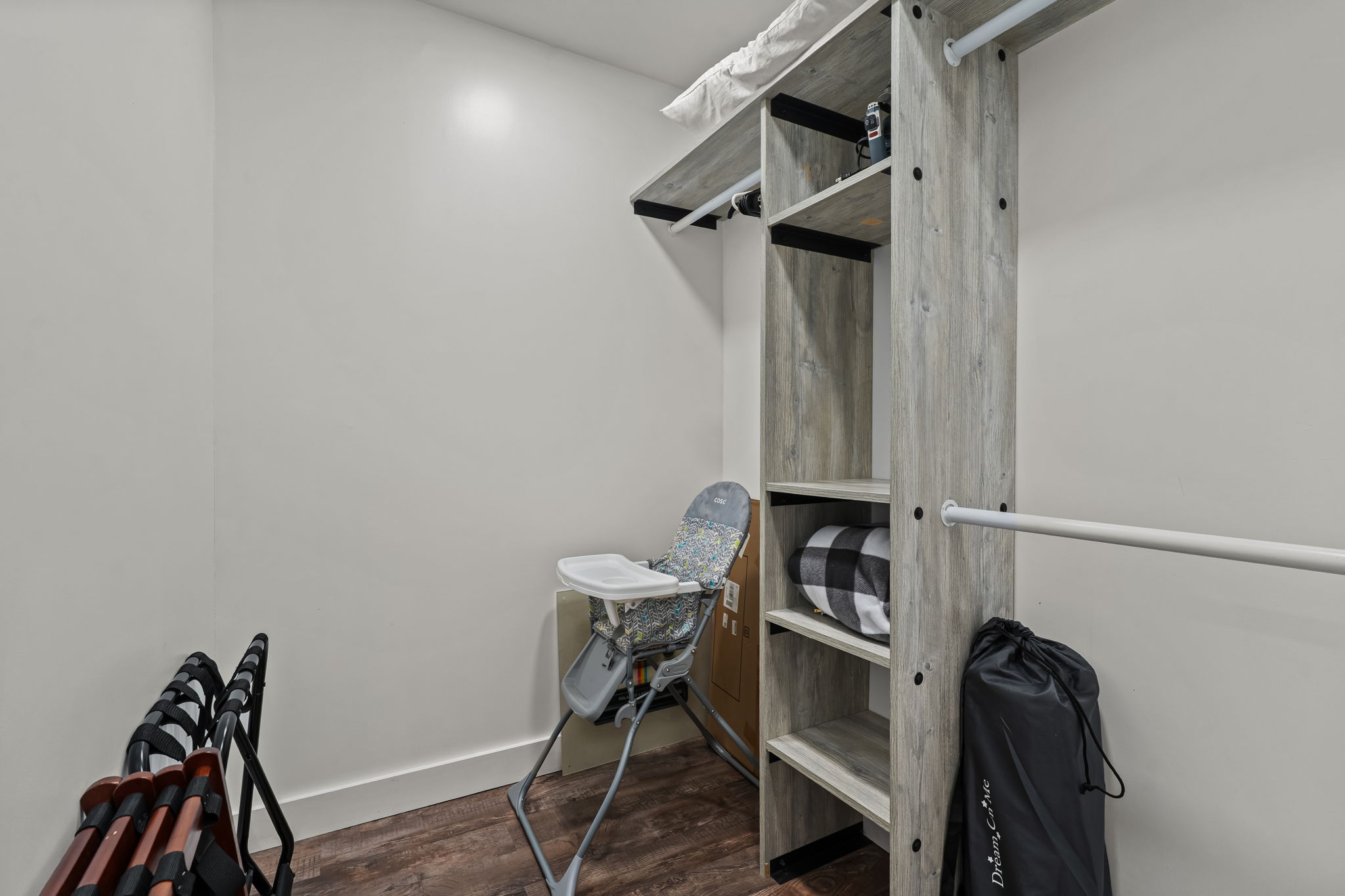 Bonus storage room with shelves, hanging space, and family-friendly extras