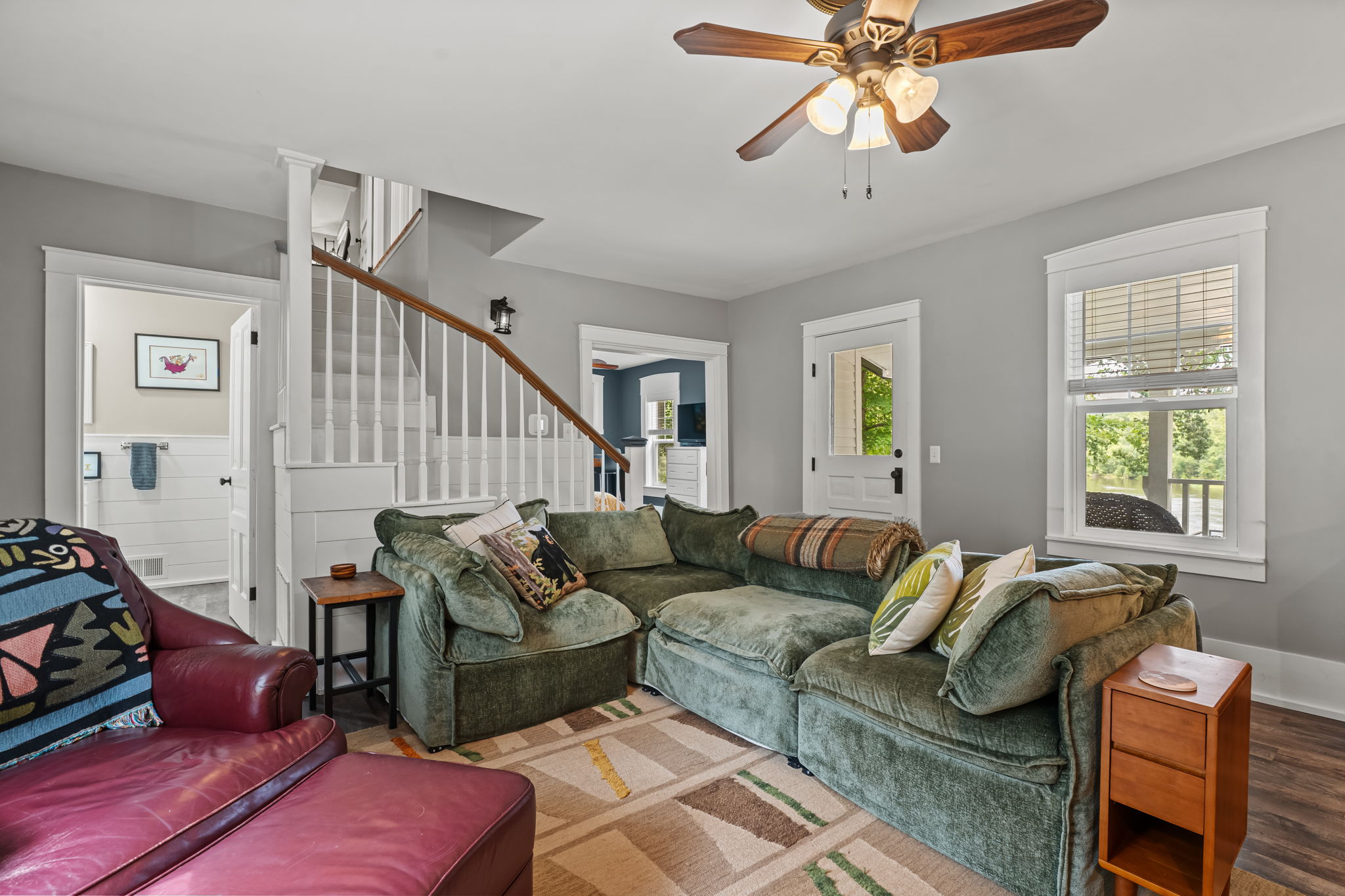 Cozy, light-filled living room with plush sectional and airy open layout
