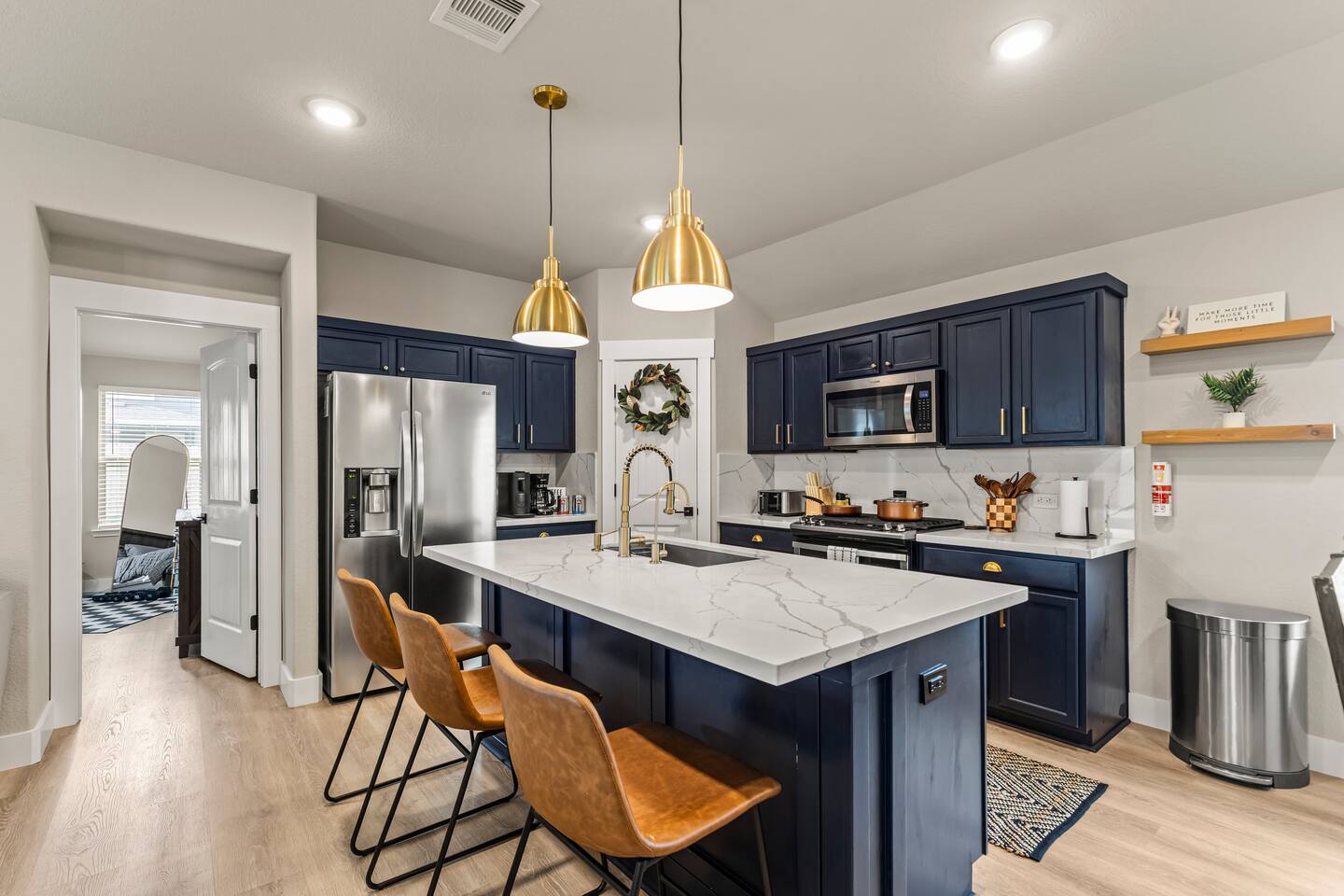 Chef's kitchen with gold accents