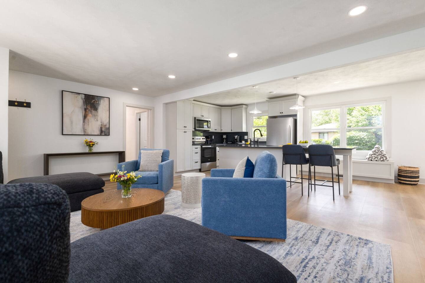 Open living room flowing into the kitchen