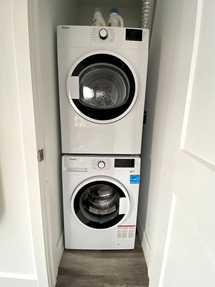 In-suite stacked washer and dryer offer added convenience for longer stays and easy laundry access during your trip.