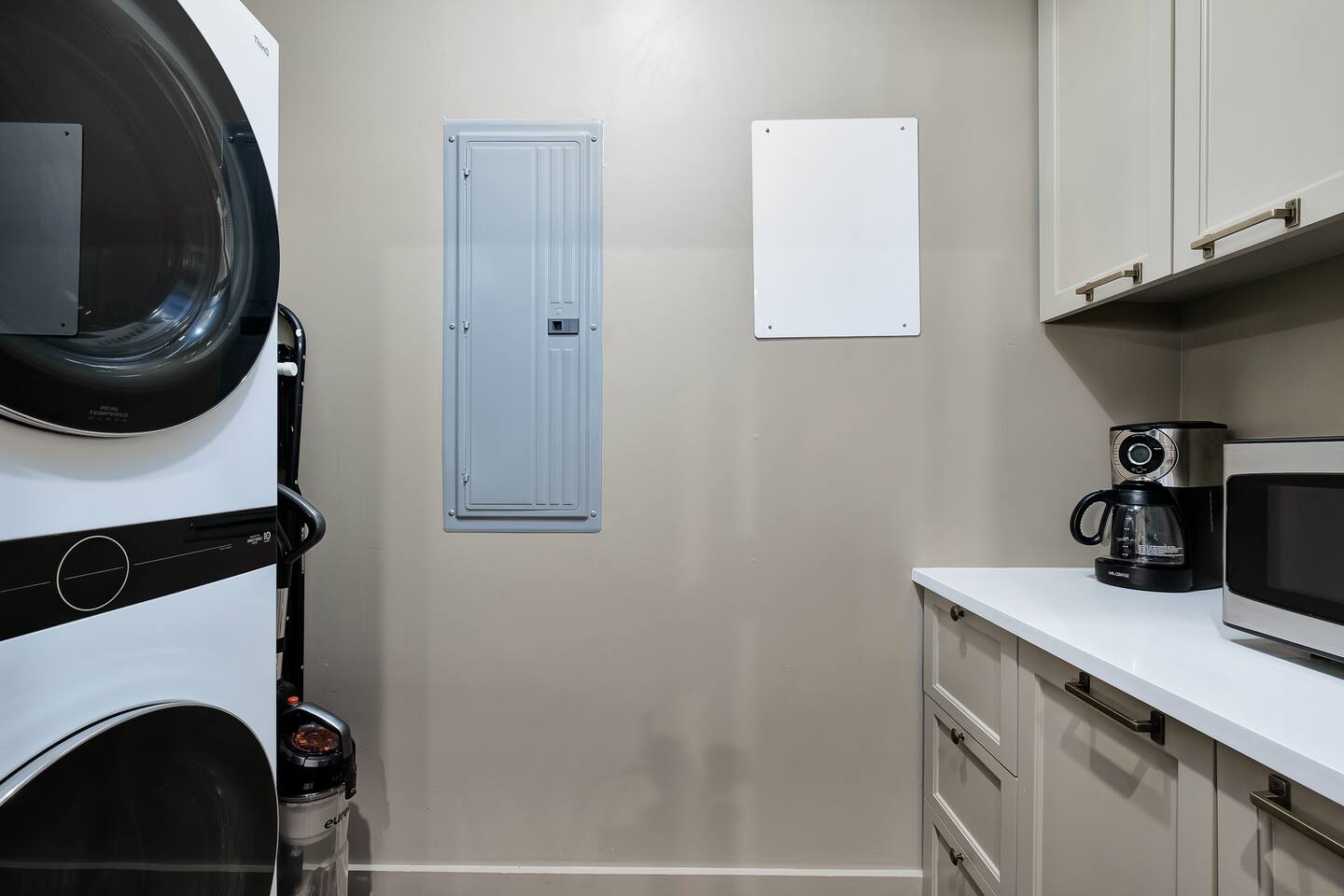 Washer and dryer inside unit.  Pantry for storage during your stay