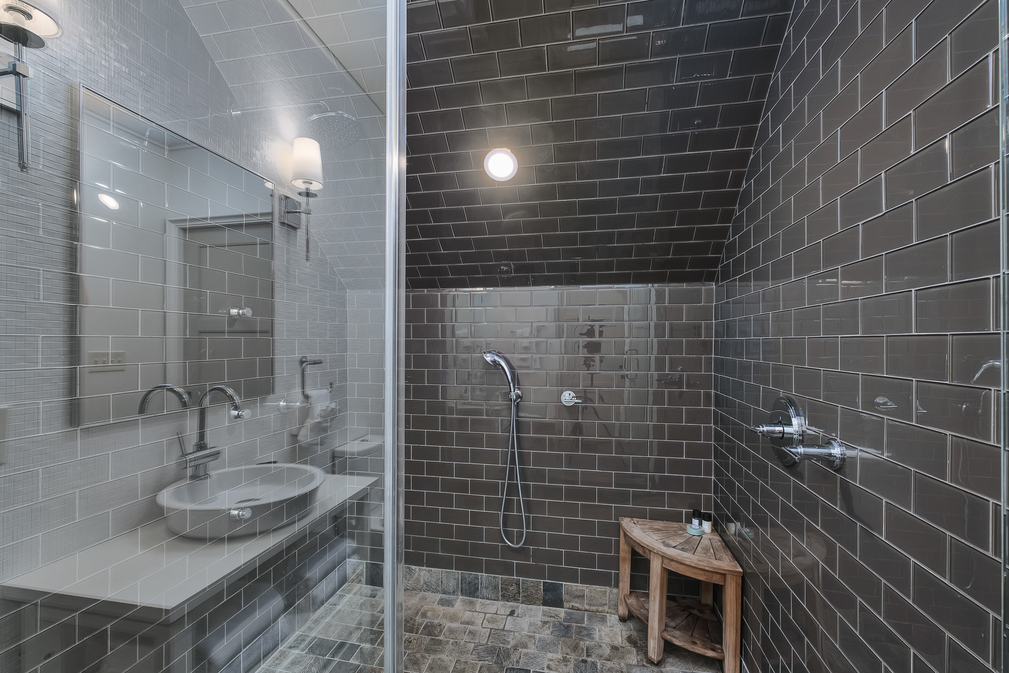 Spa-style walk-in shower with sleek tile and modern design