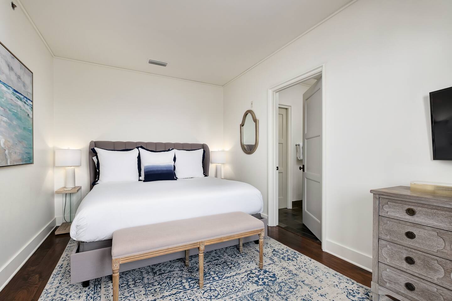 Primary bedroom overlooking Barrett Square with ensuite.