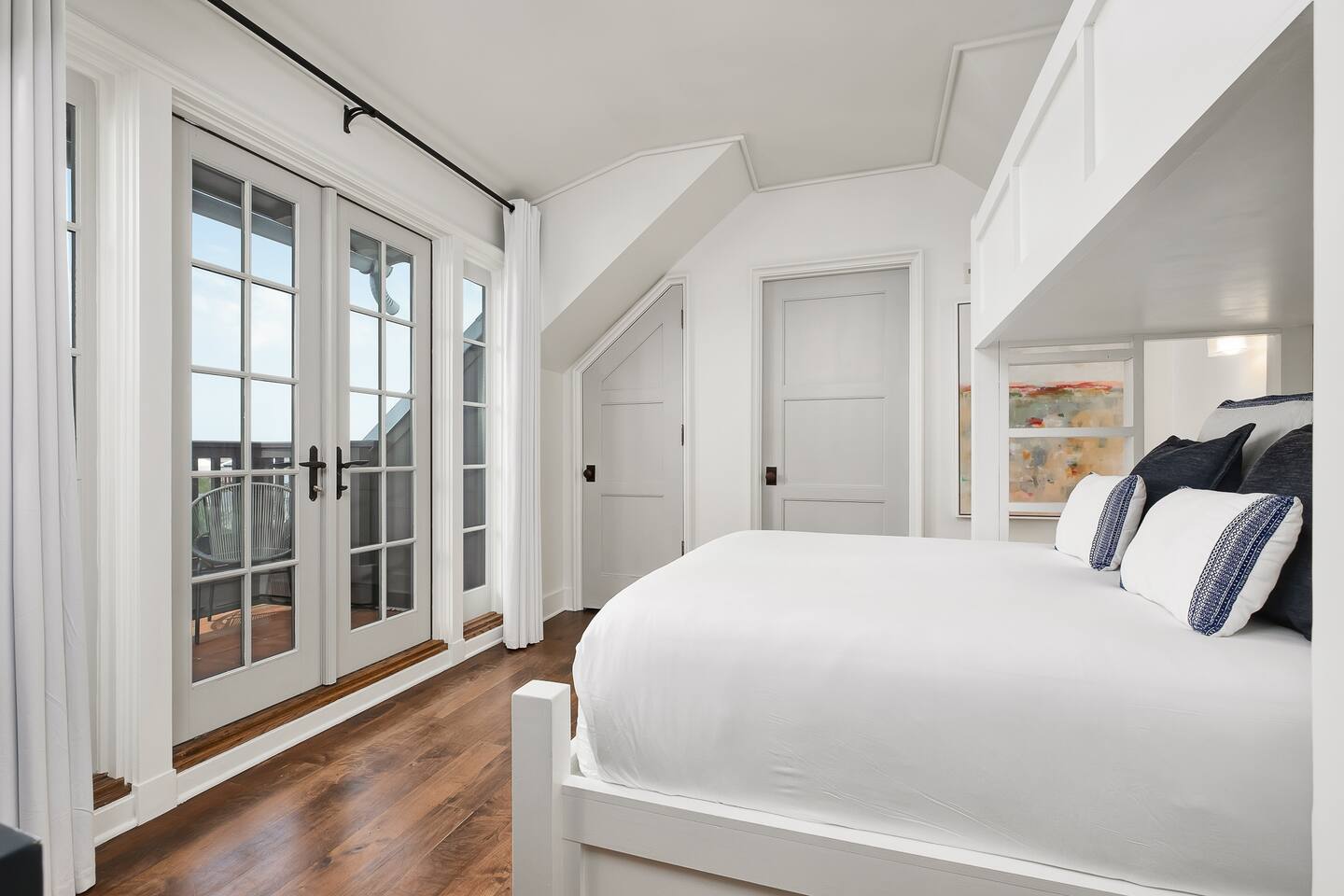 Twin over queen bunk room with private balcony overlooking the town
