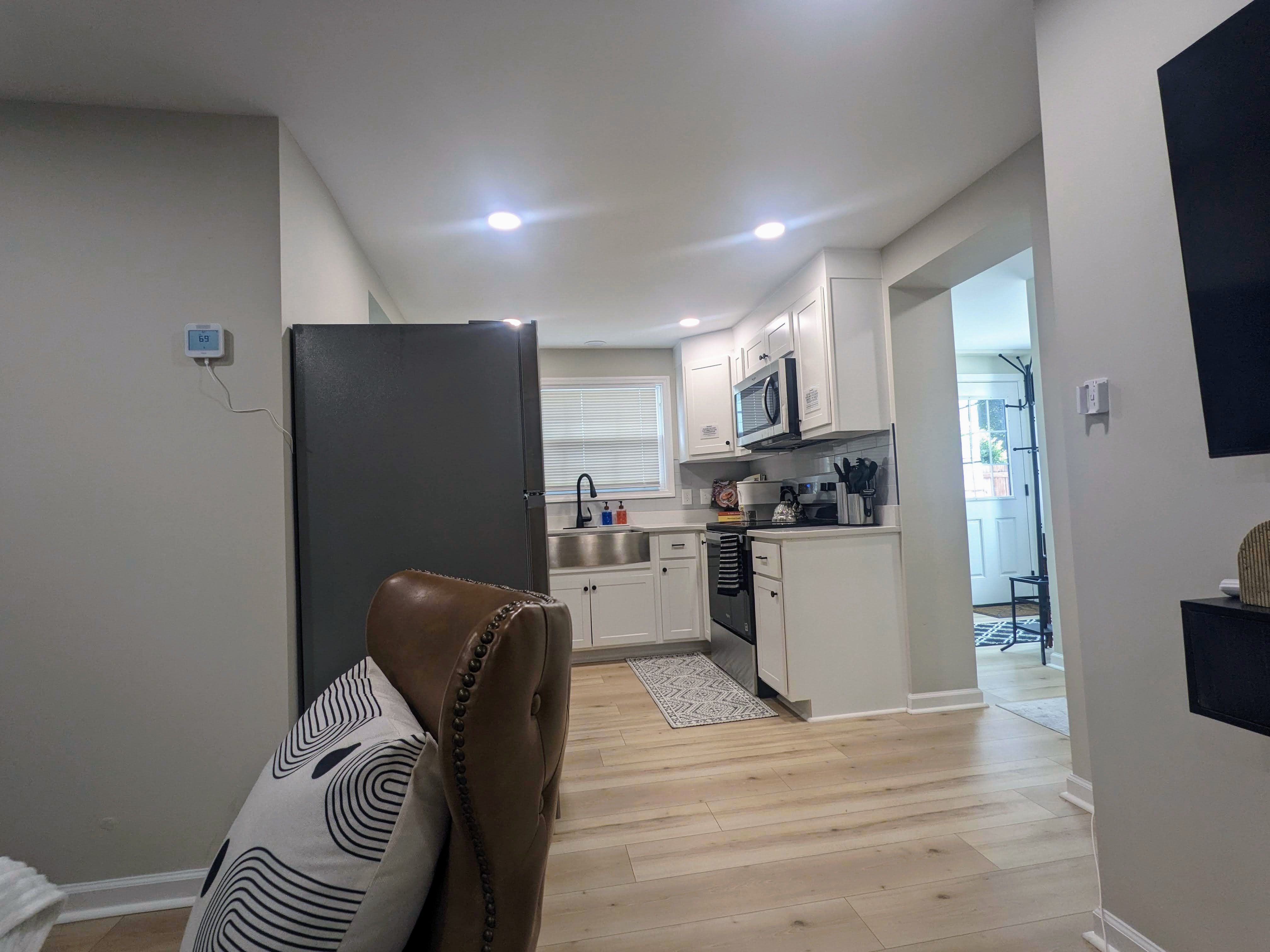 Bright modern kitchen with full-size appliances and clean, updated finishes