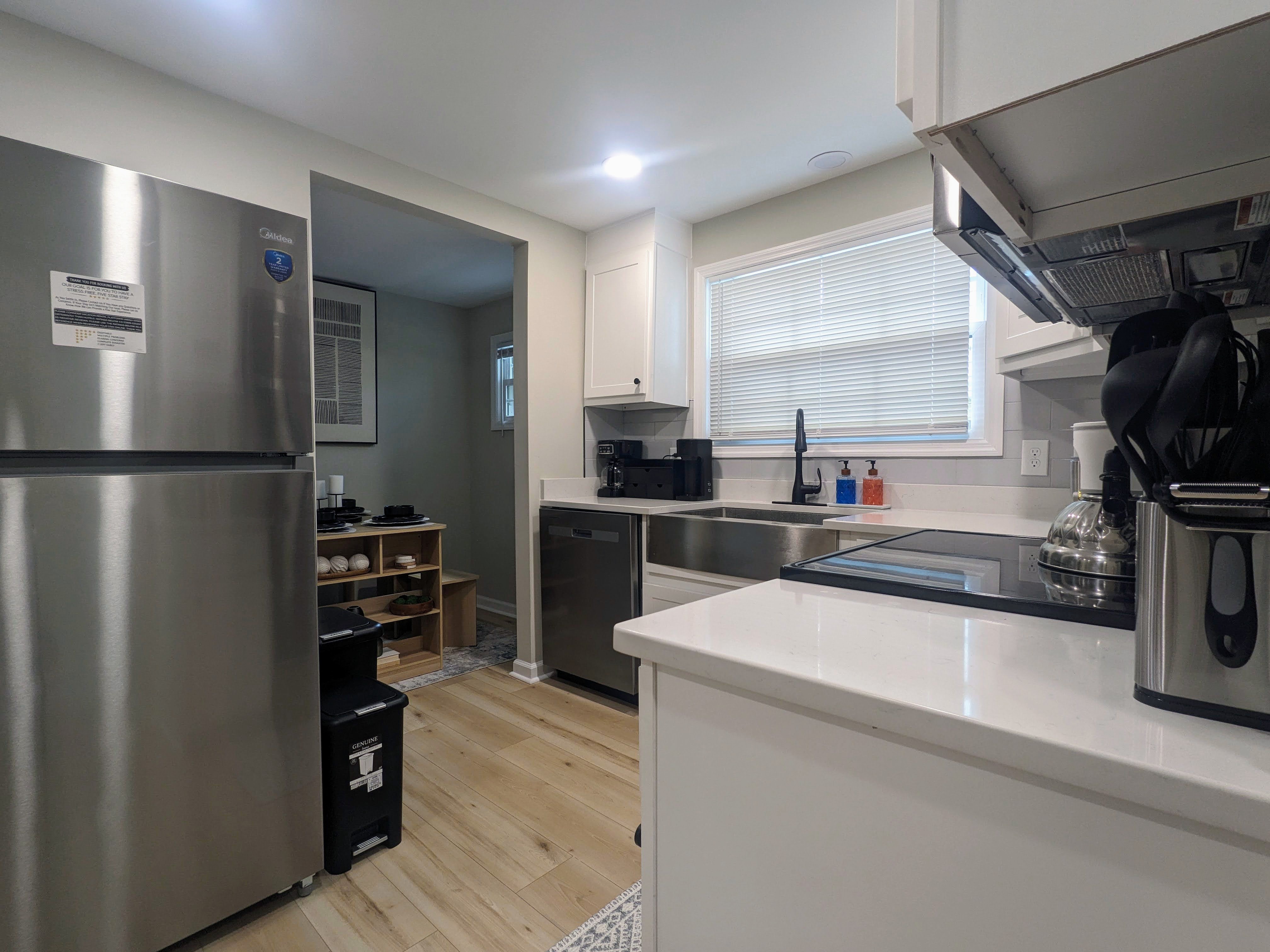 Bright modern kitchen with stainless appliances and ample prep space