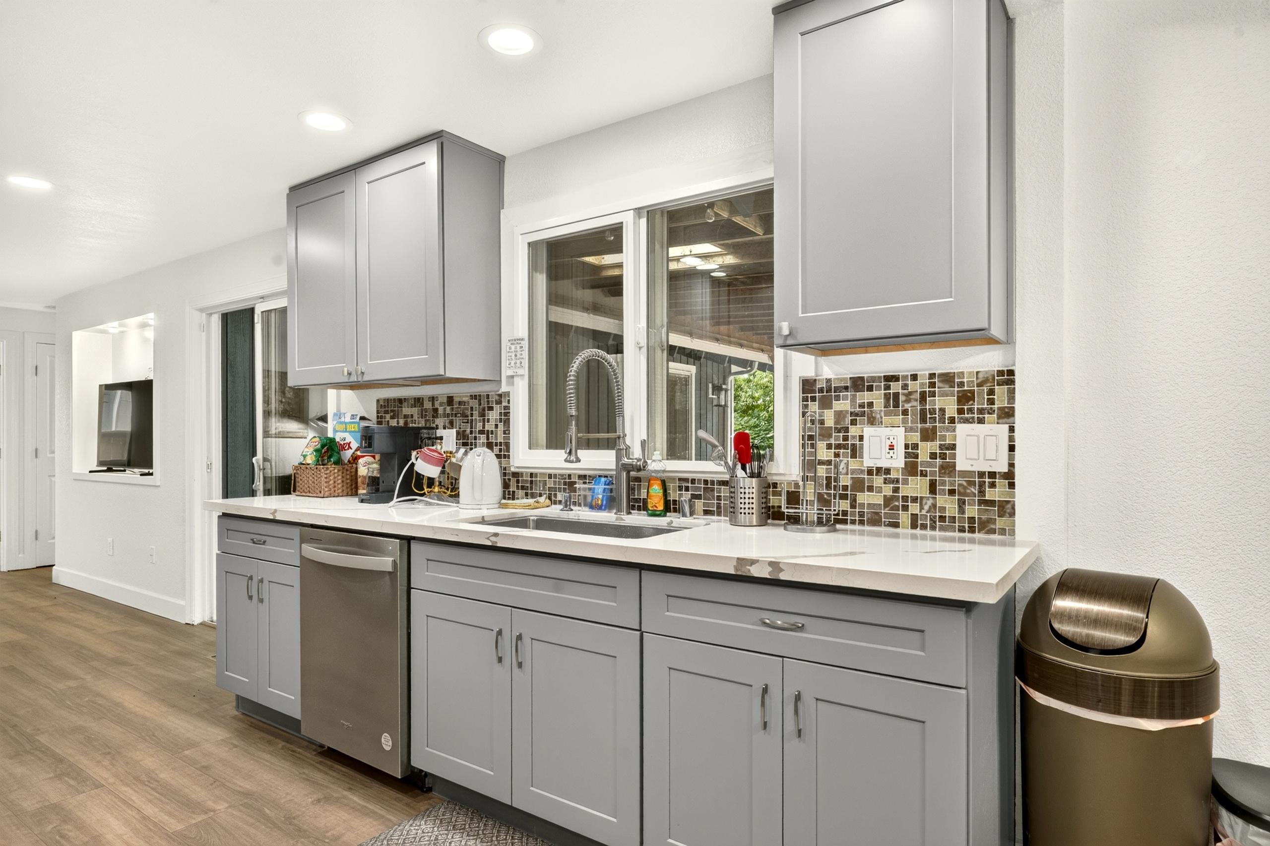 Bright modern kitchen with stylish finishes and ample prep space