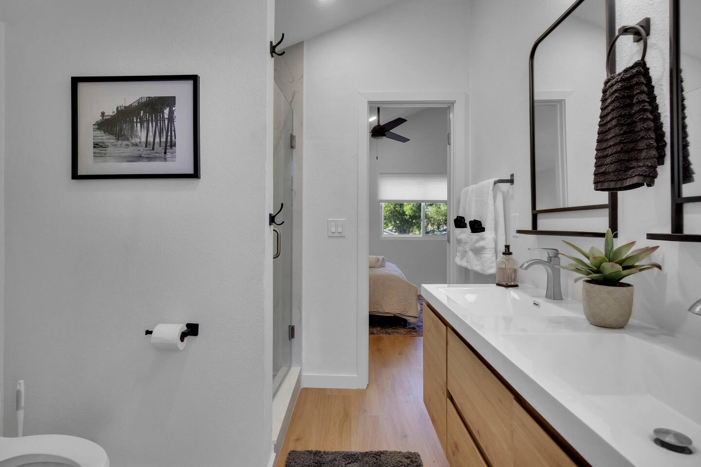 Jack and Jill shared bathroom with bedroom 2 and 3. Double sink, fully stocked. Lots of storage