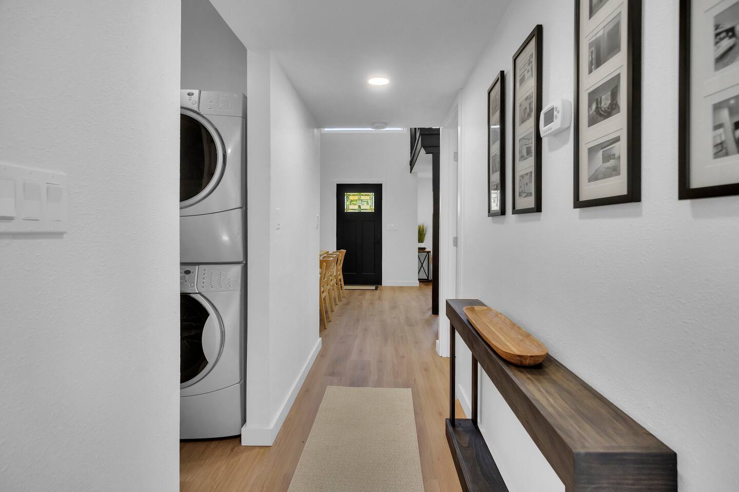 Private washer and dryer with laundry detergent provided.