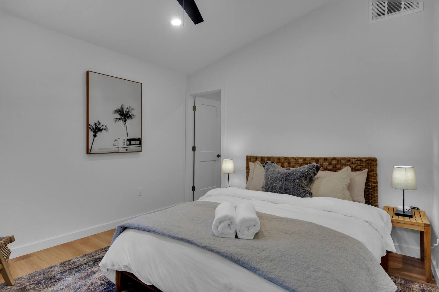 Upstairs bedroom 2 with queen bed and large walk in closet. Bedside night lights and USB charging ports.