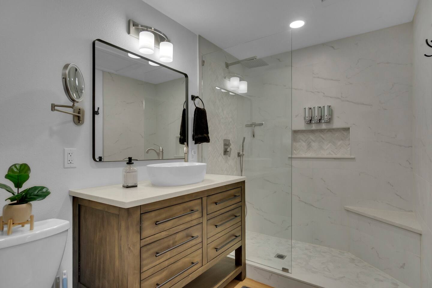 Master bathroom full bathroom in master with single vanity sink and double storage for two people.