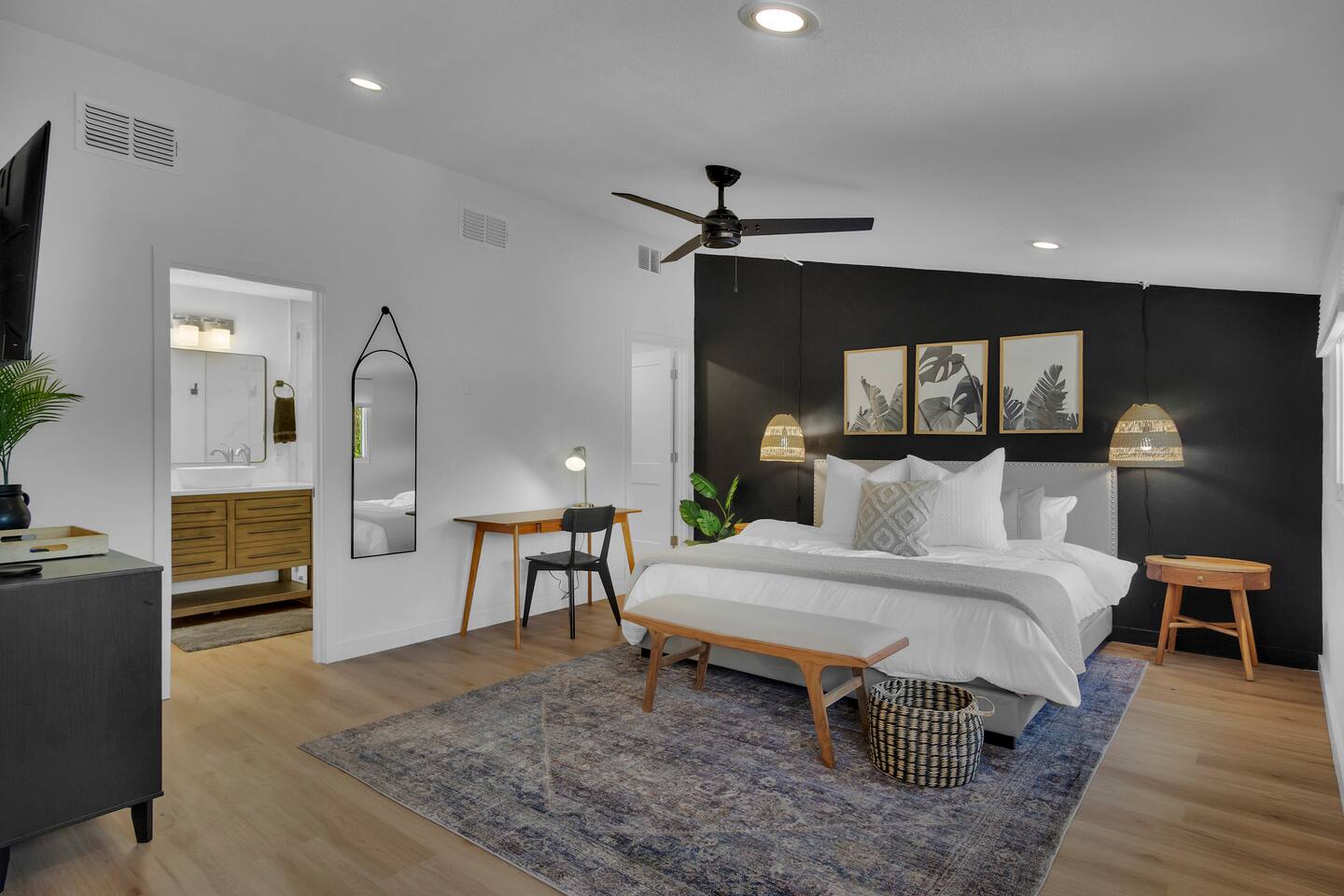 Master bedroom has a King bed and a workstation.  Walk in closet and dresser for clothes.