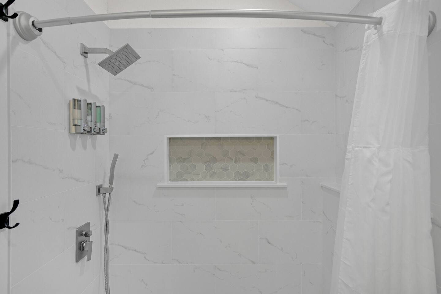 Full bath with tub and shower downstairs