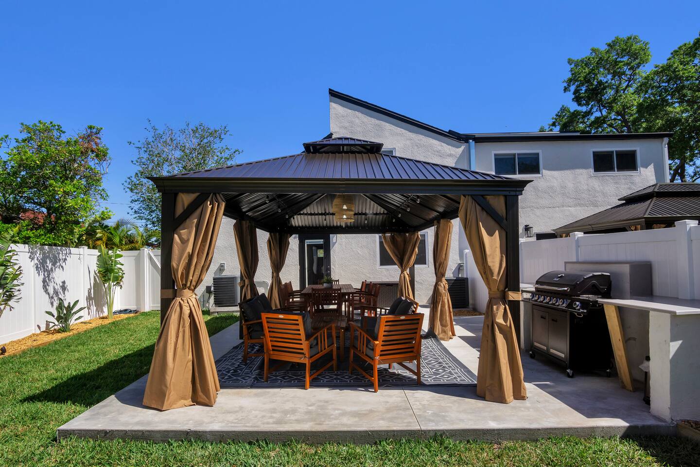 Enjoy relaxing with family and friends with a gas bbq grill and covered area.