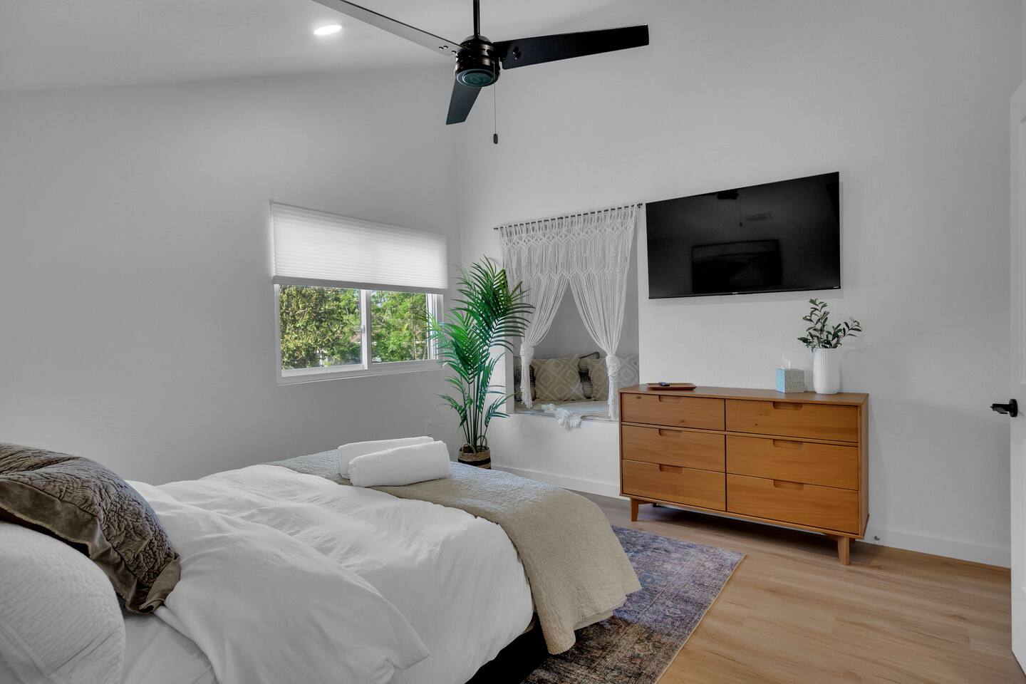 Bedroom 3 has a cozy reading nook to escape in, lots of drawer space & a smart TV