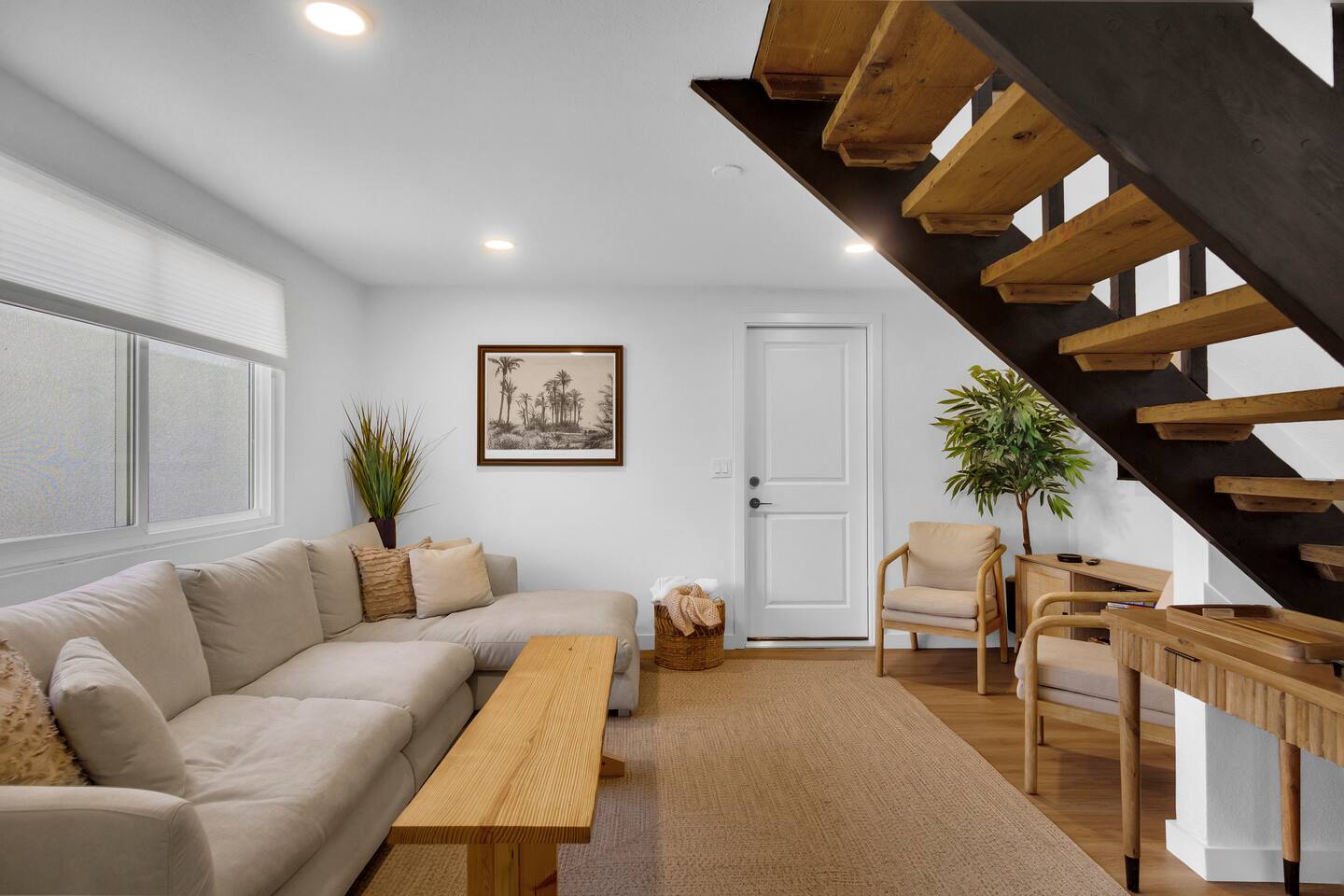 downstairs living room area with comfy seating , Smart TV and games