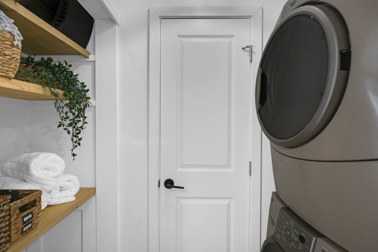 Laundry area with front loading washer, dryer and laundry soap included for your convenience.