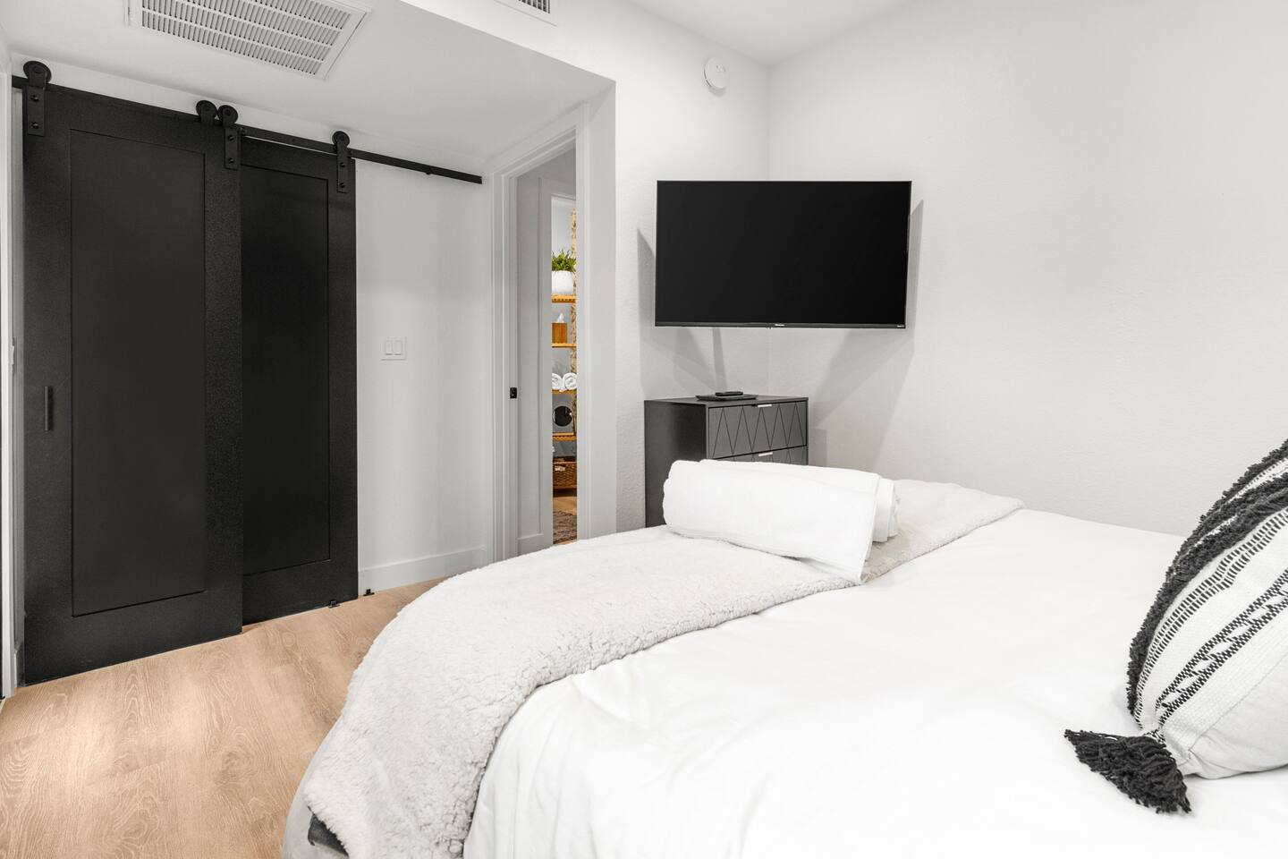 Built in closet for luggage storage and hanging clothes.