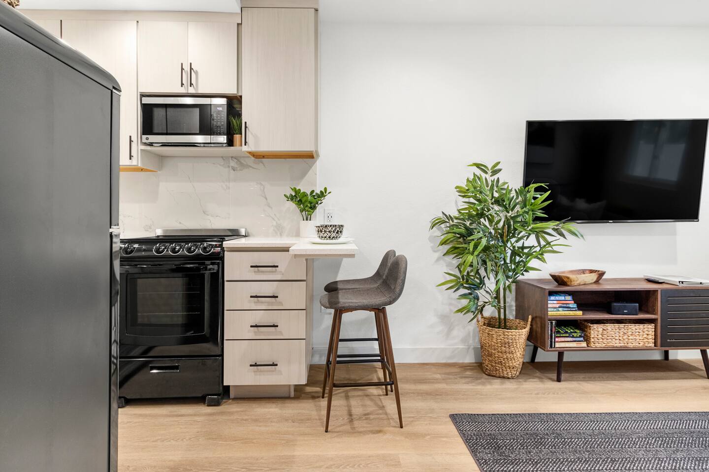 Bartop serves as eating counter and workspace. USB outlet in wall for laptop.