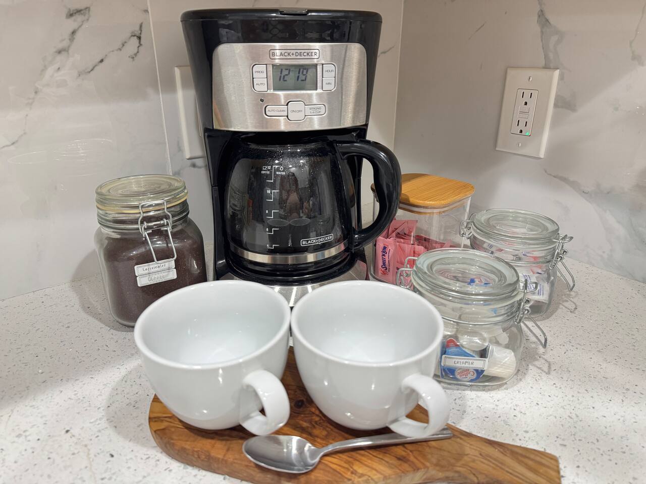 Full coffee bar with coffee, creamer, sugar.   Tea also provided.