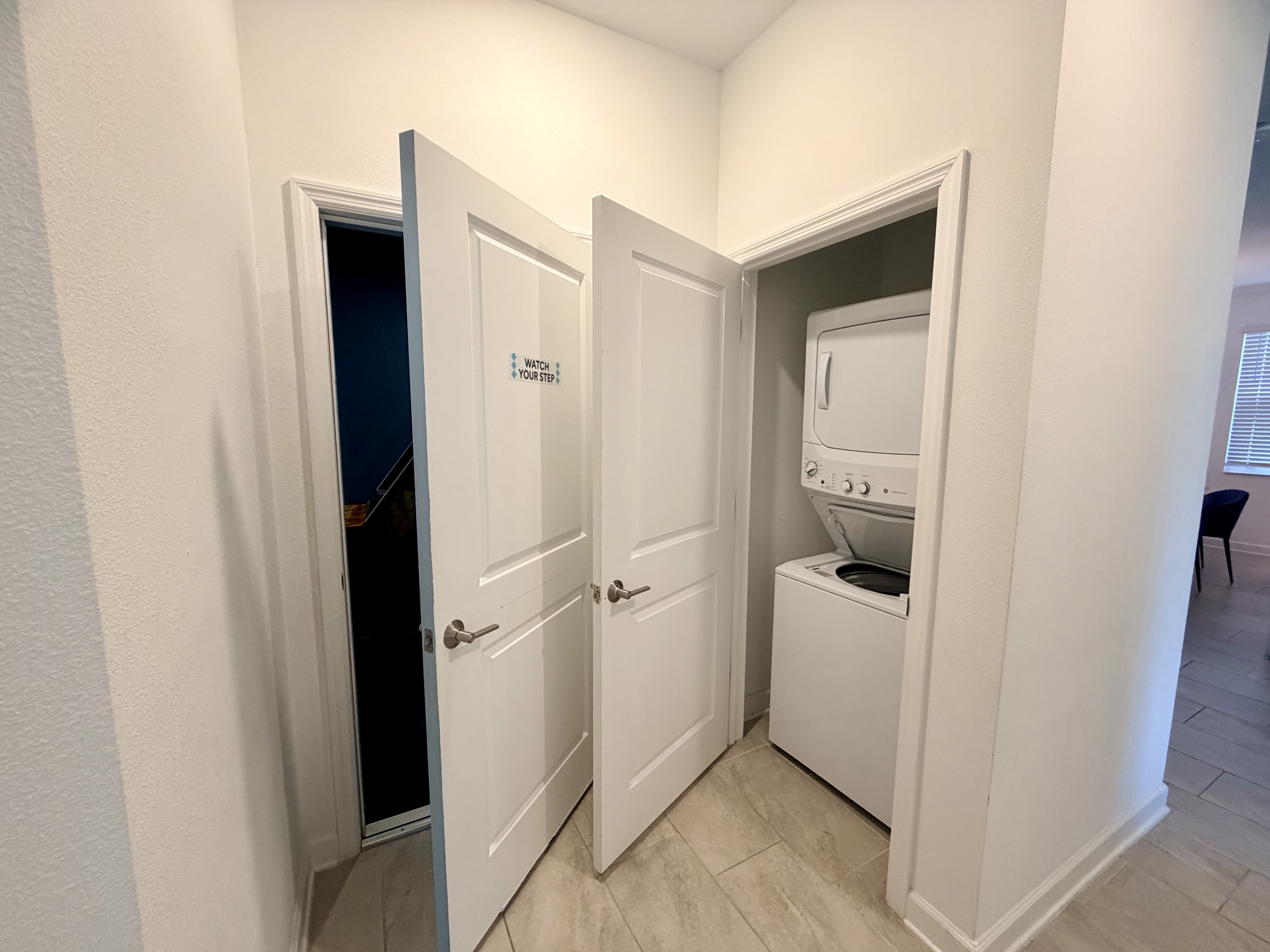 Convenient in-unit washer and dryer with a clean, bright modern layout
