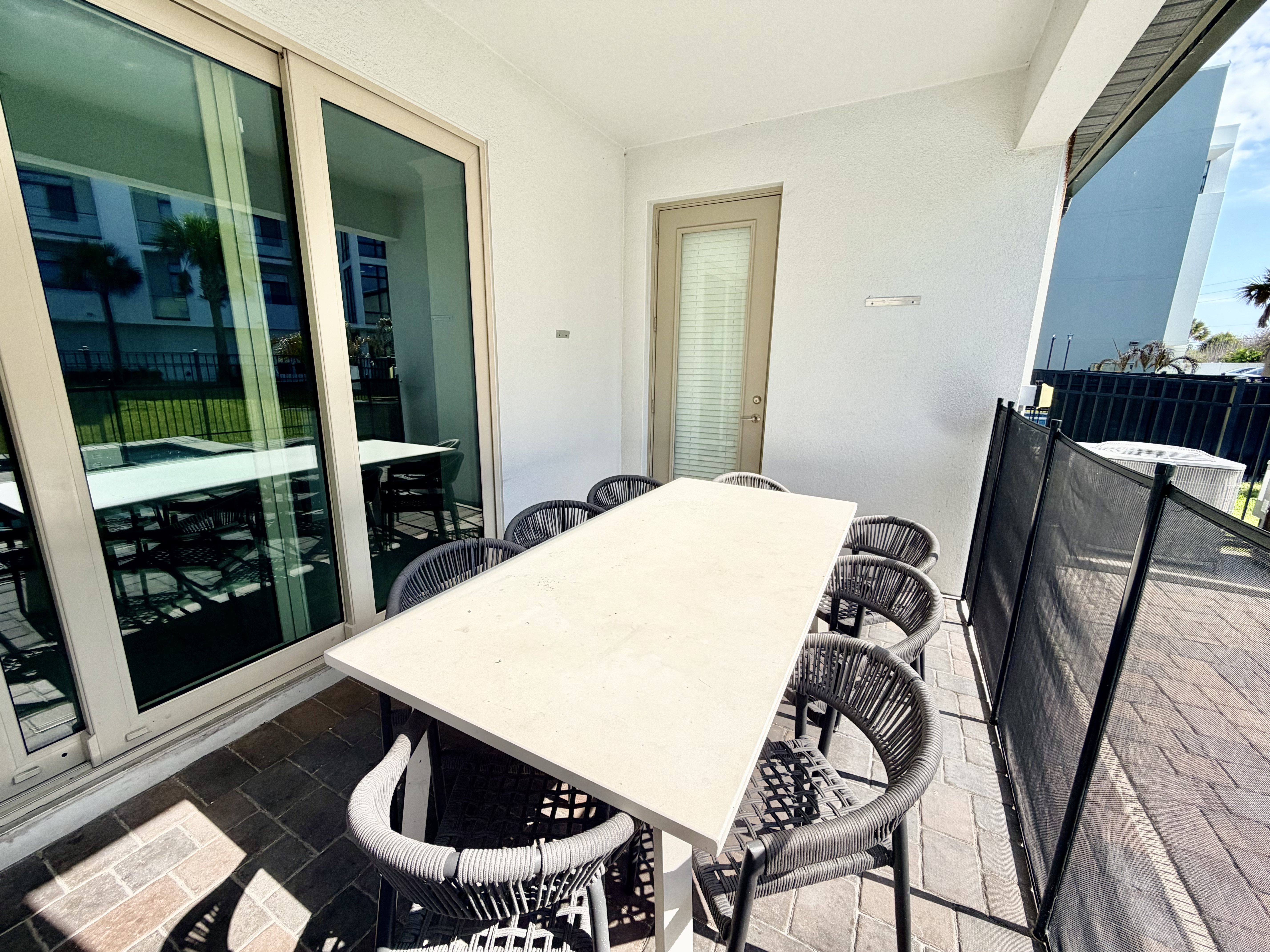 Private covered patio with outdoor dining for six