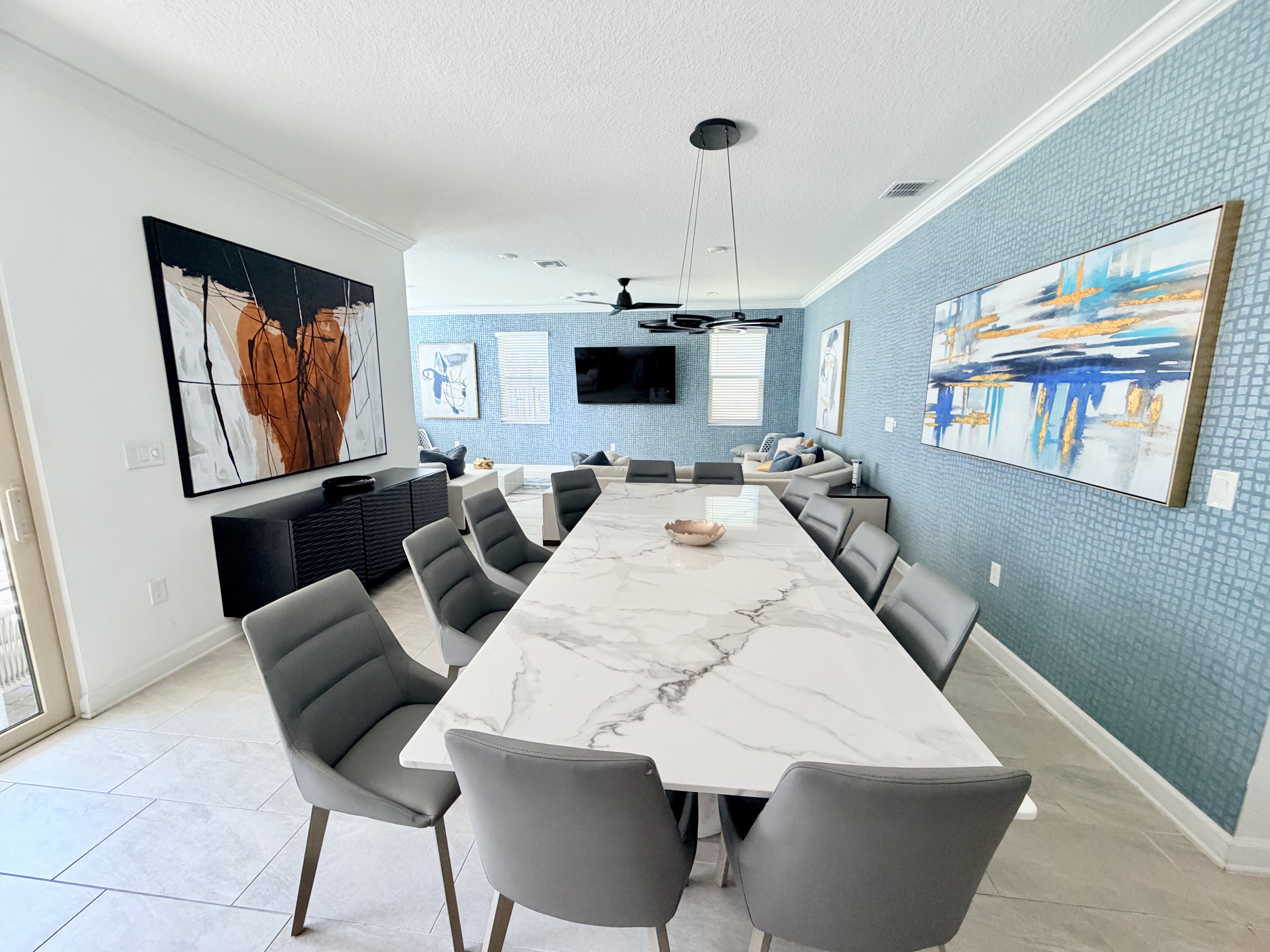Spacious modern dining area with designer touches and open lounge seating