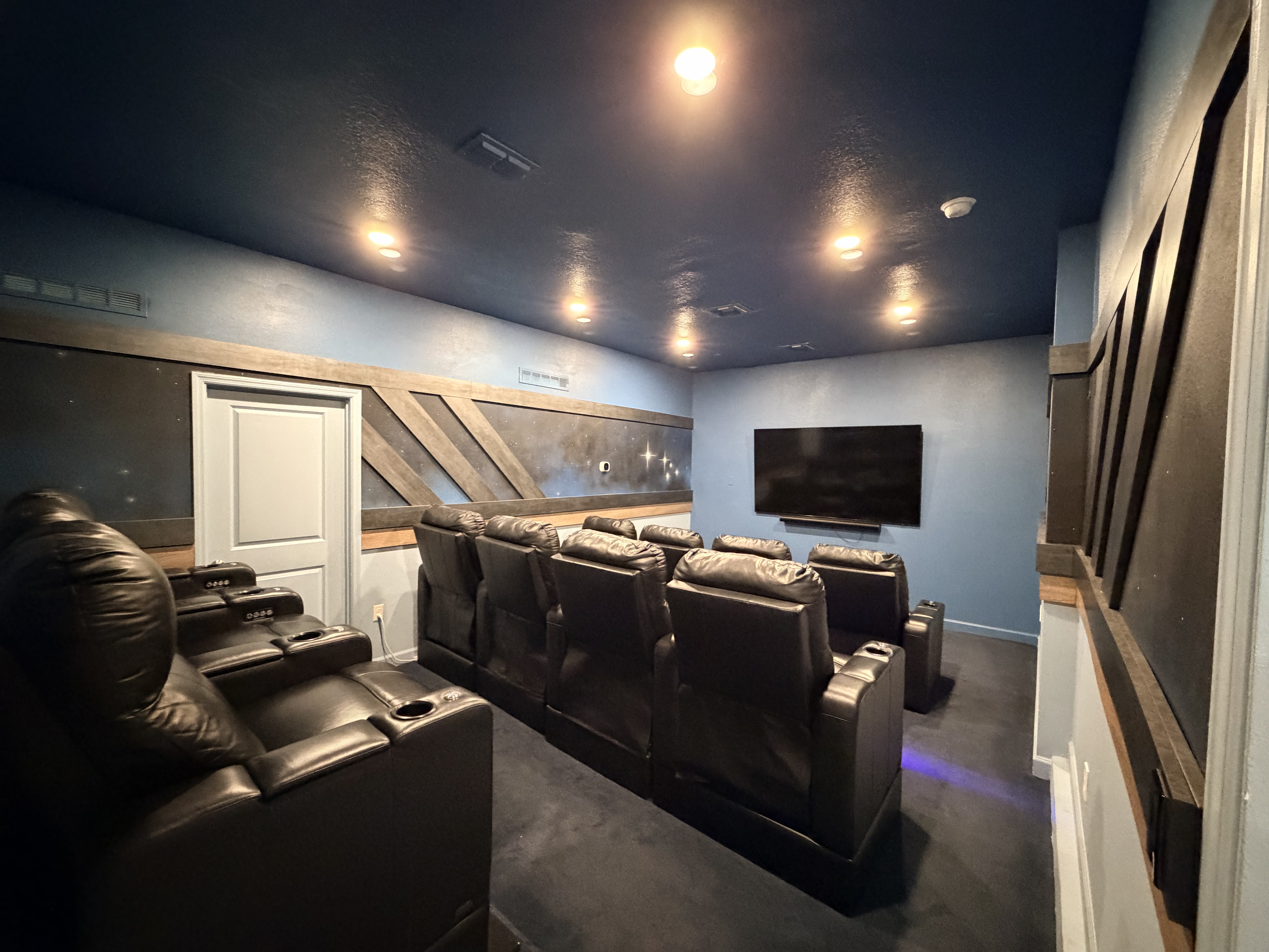 Private home theater with leather recliners for the ultimate movie night