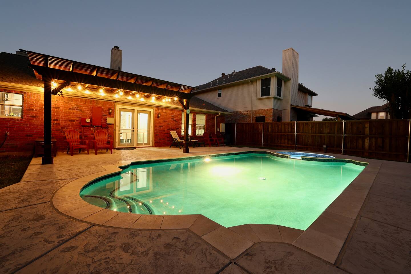 Stylish 4 BR home with heated pool/spa game room