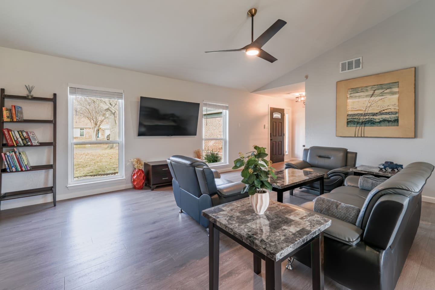 Modern 4 Br 2 Ba home with private fenced backyard