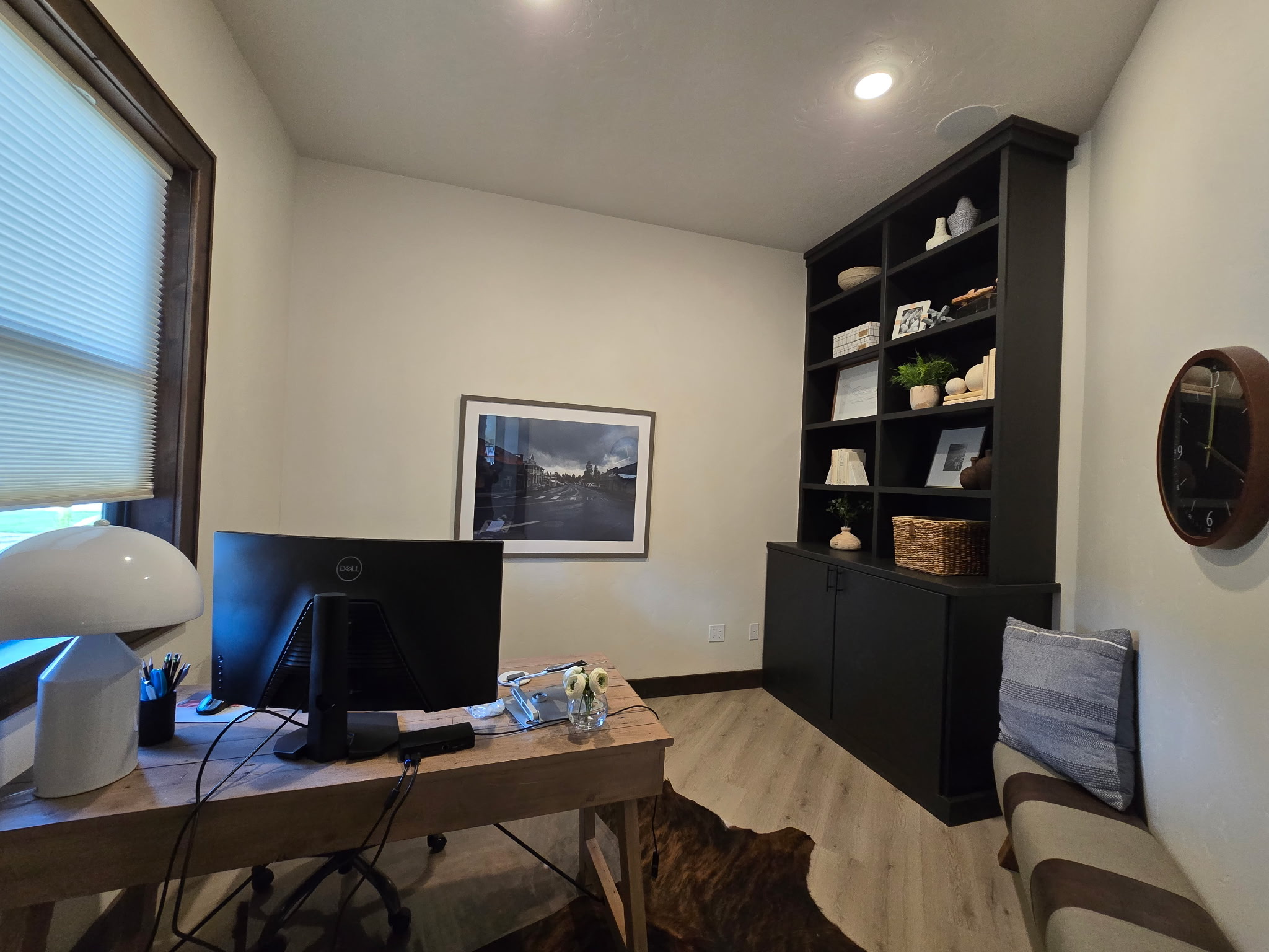 Bright, stylish home office with built-ins and dedicated workspace