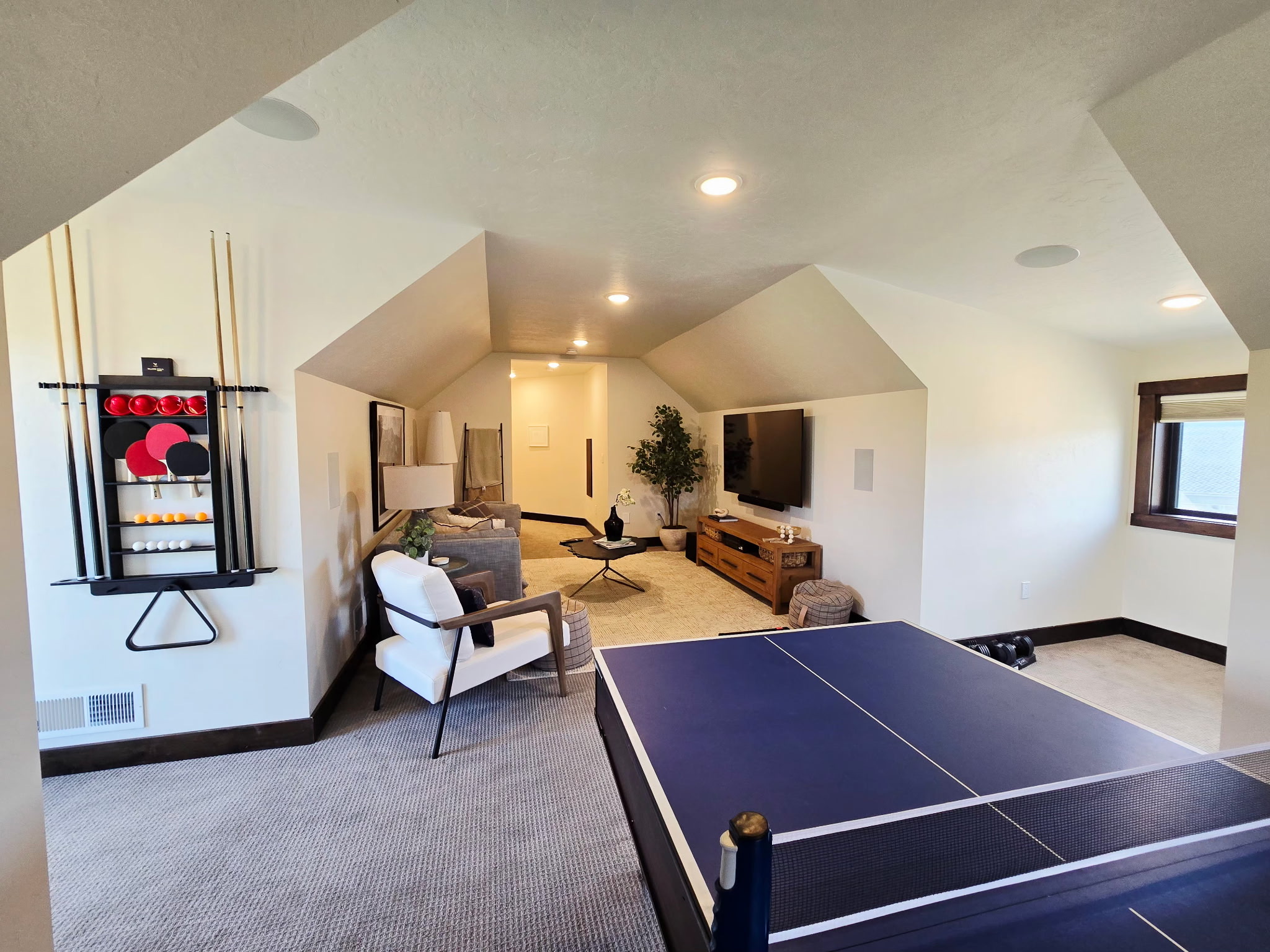 Loft game room with ping pong, TV lounge, and space to unwind