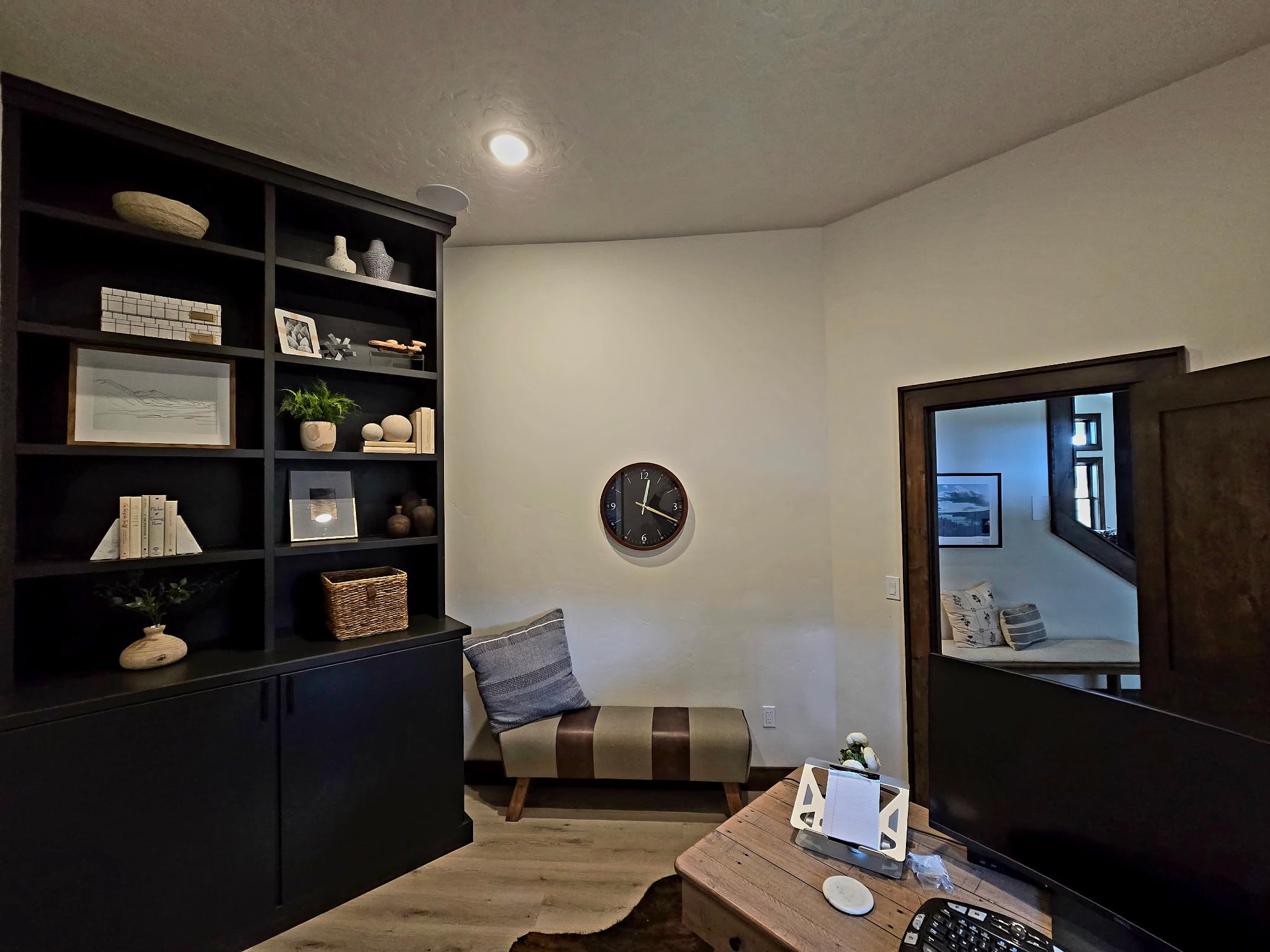 Stylish reading nook with custom shelving and cozy built-in seating