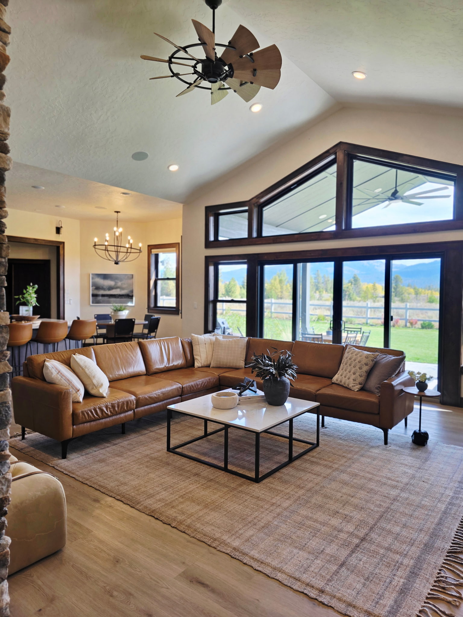 Bright great room with mountain views, vaulted ceilings, and stylish seating