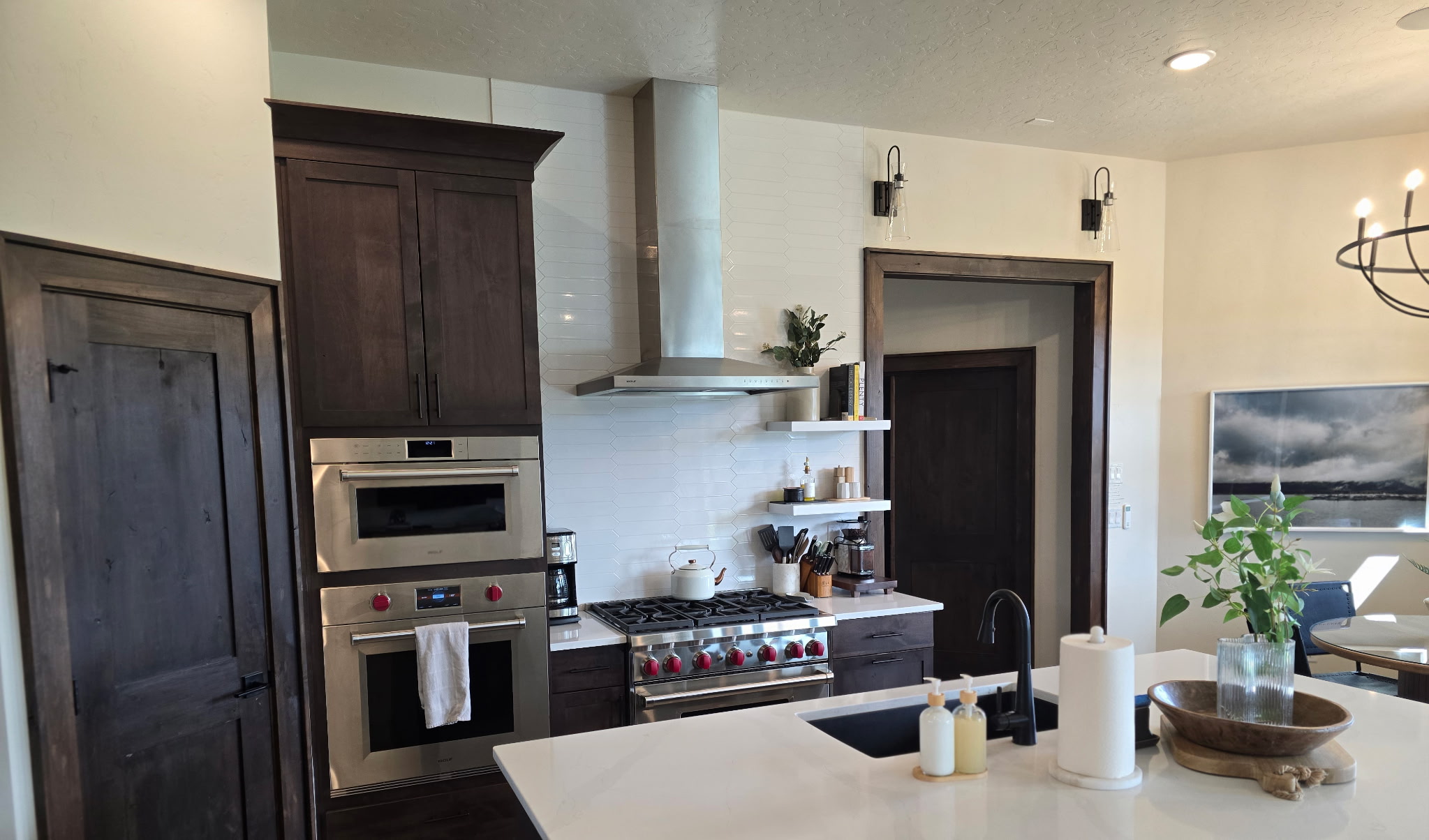 Modern chef’s kitchen with waterfall island and premium finishes