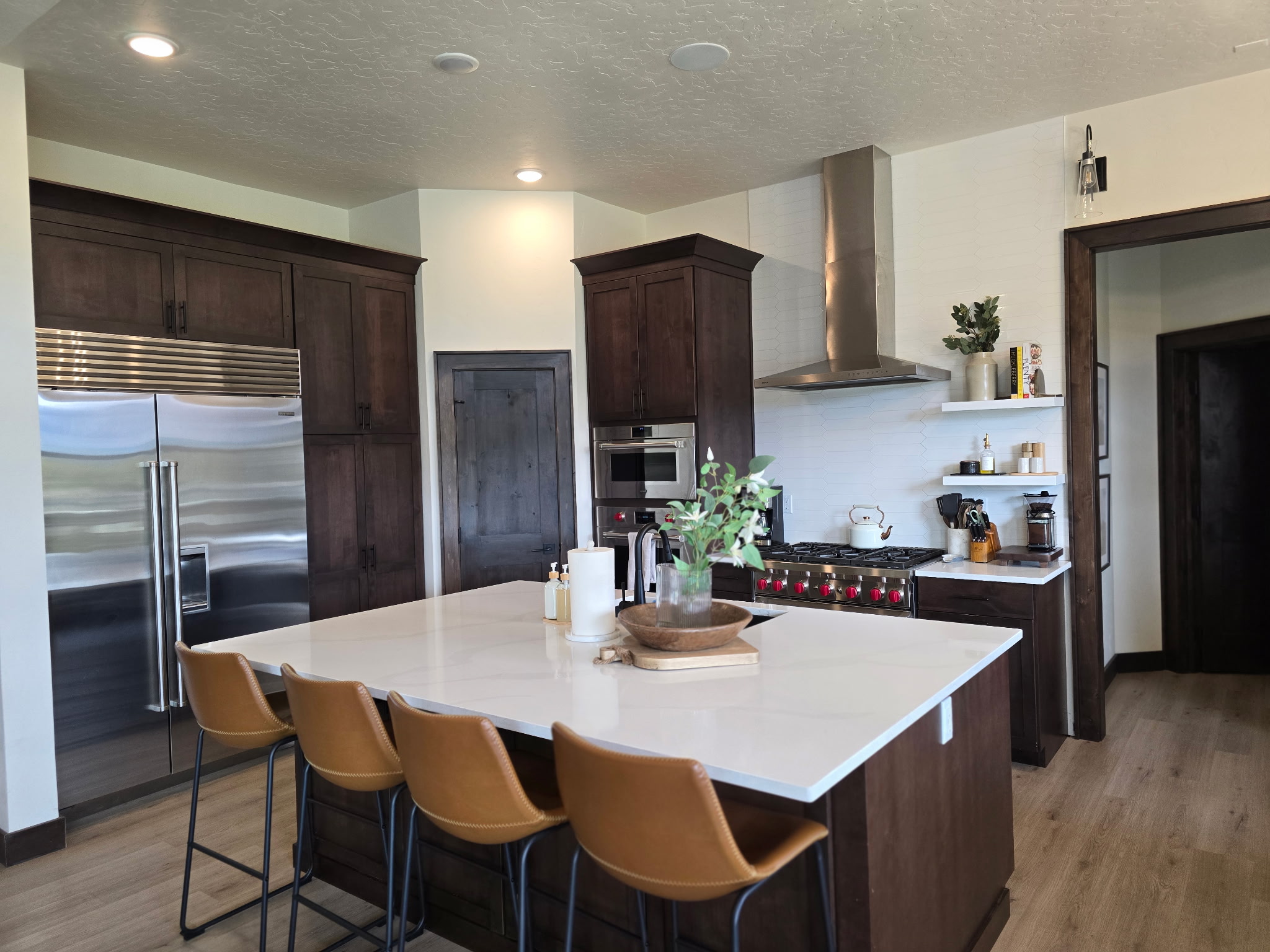 Spacious gourmet kitchen with oversized island and premium appliances