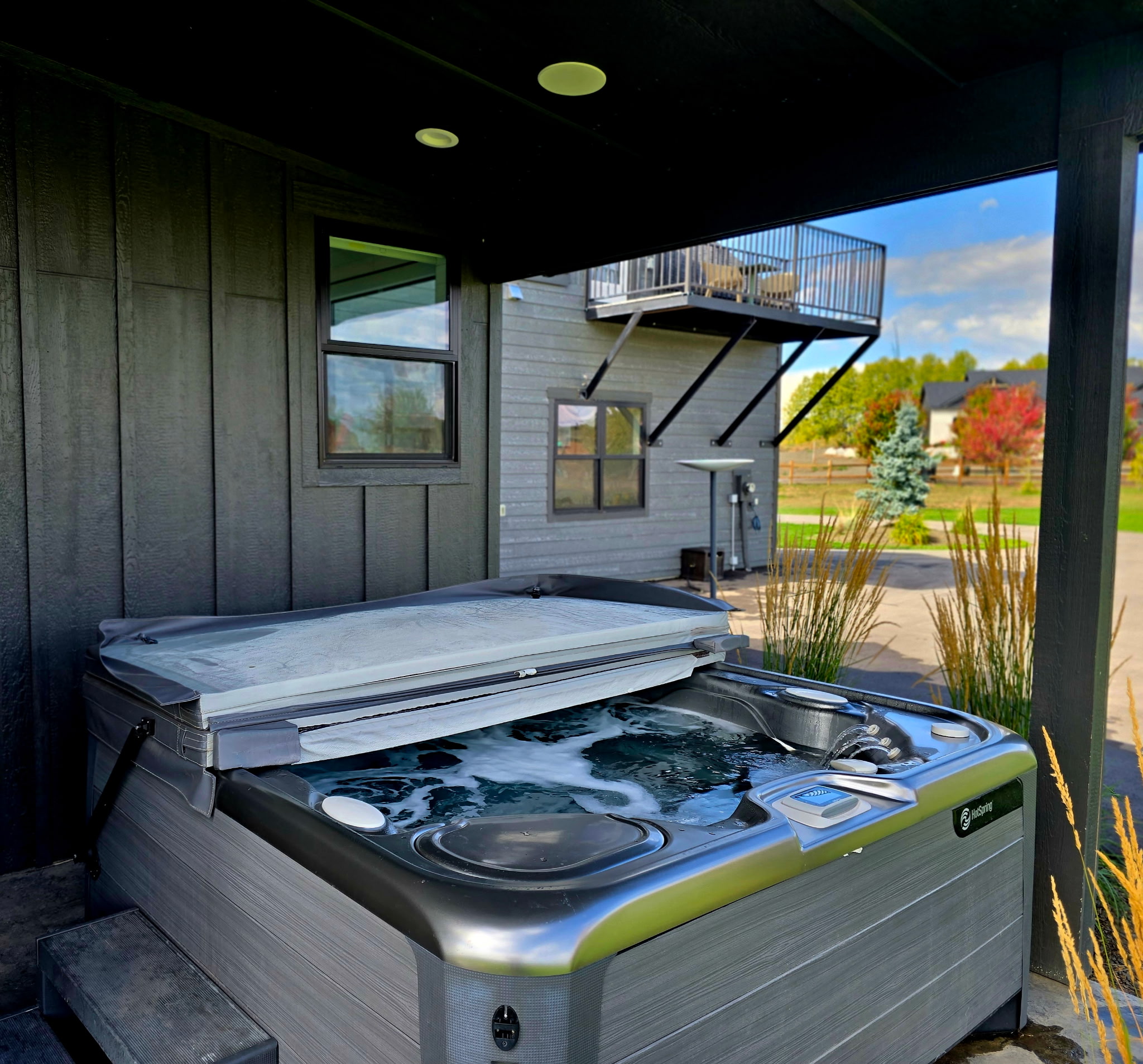 Private covered hot tub with peaceful outdoor views