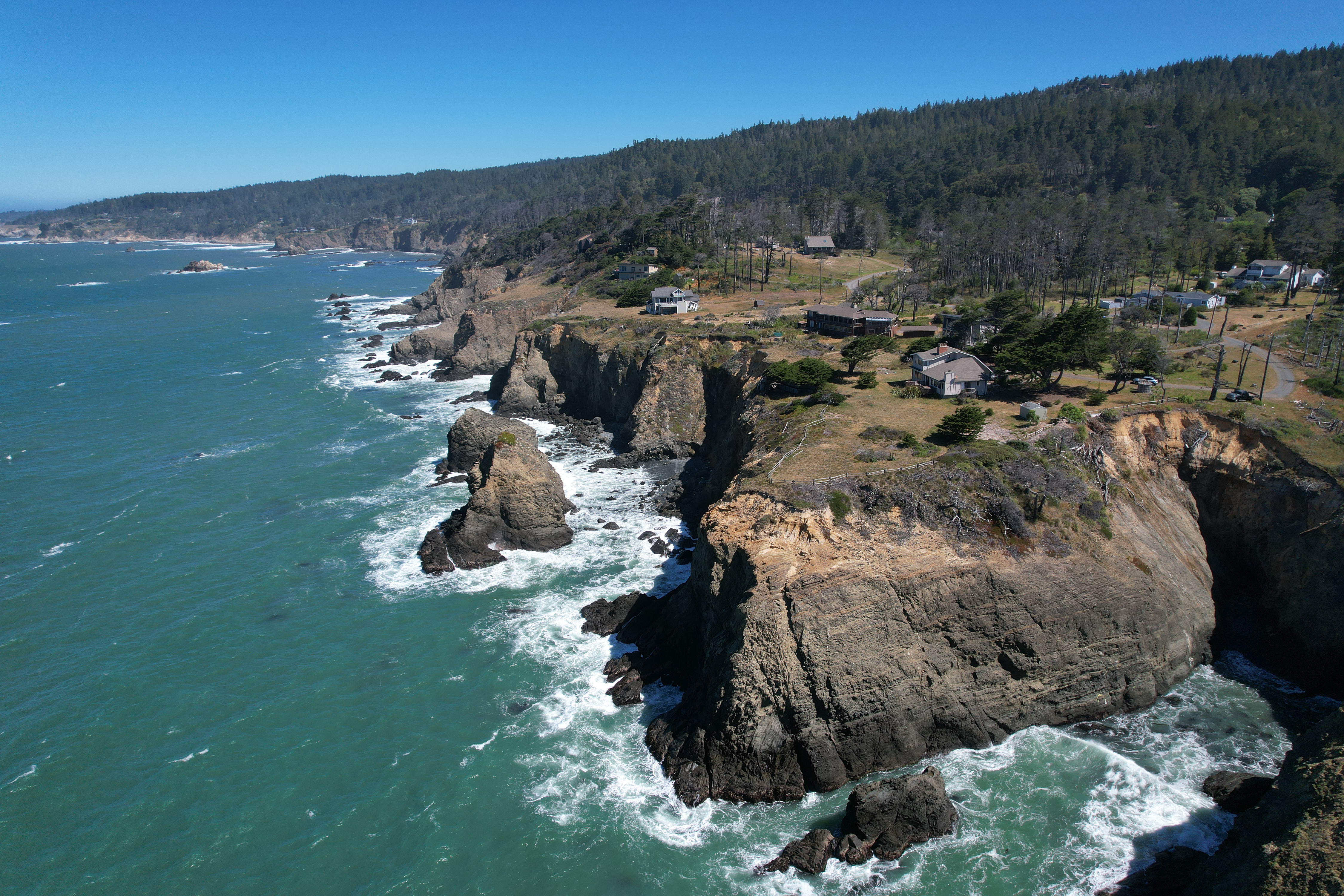 Dramatic cliffside retreat with sweeping ocean views and coastal serenity